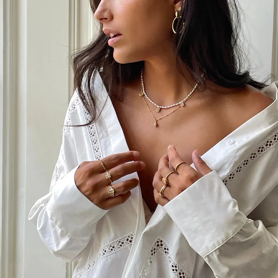 Collana 24Kae  con perle e ciondoli zirconi bianchi e pietra verde 32456Y