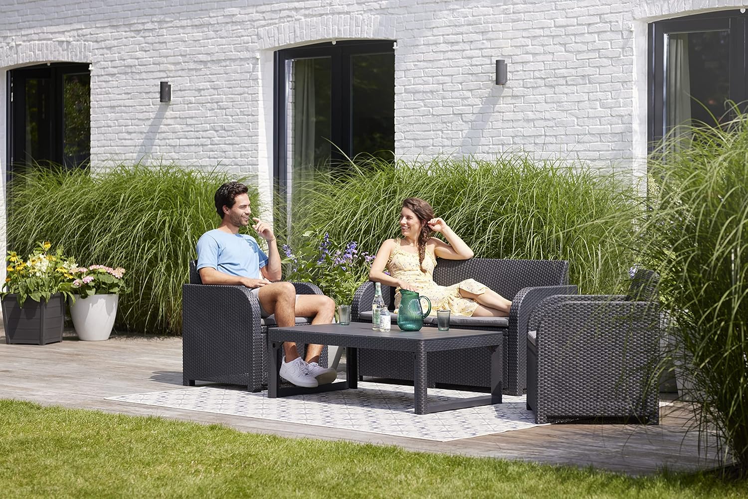 Keter Carolina Lounge Set, Garden Furniture with 2 Seater Sofa, 2 Armchairs and Table with Adjustable Height and Wood Effect, Graphite