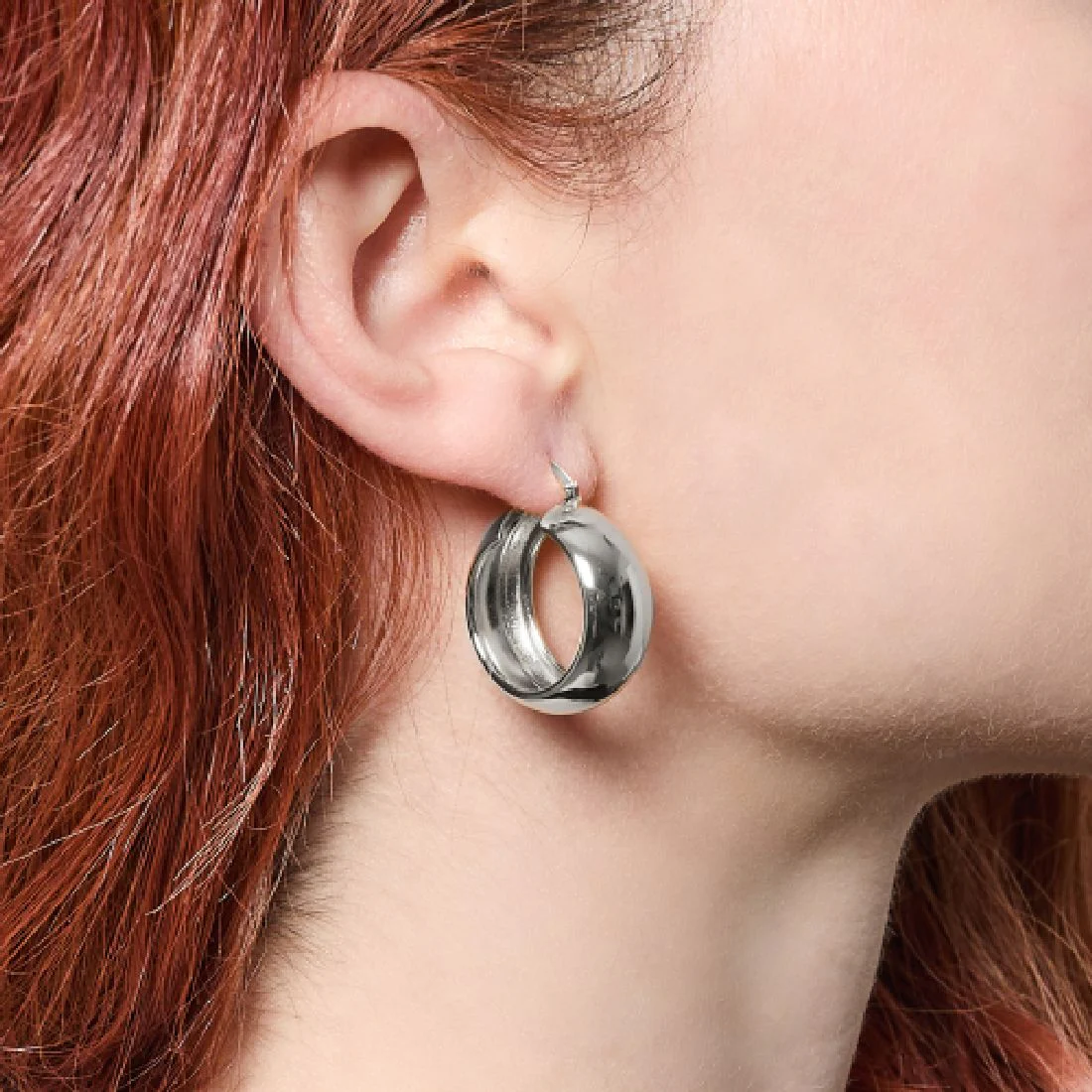 Orecchini Unoaerre a cerchio argentati 2690