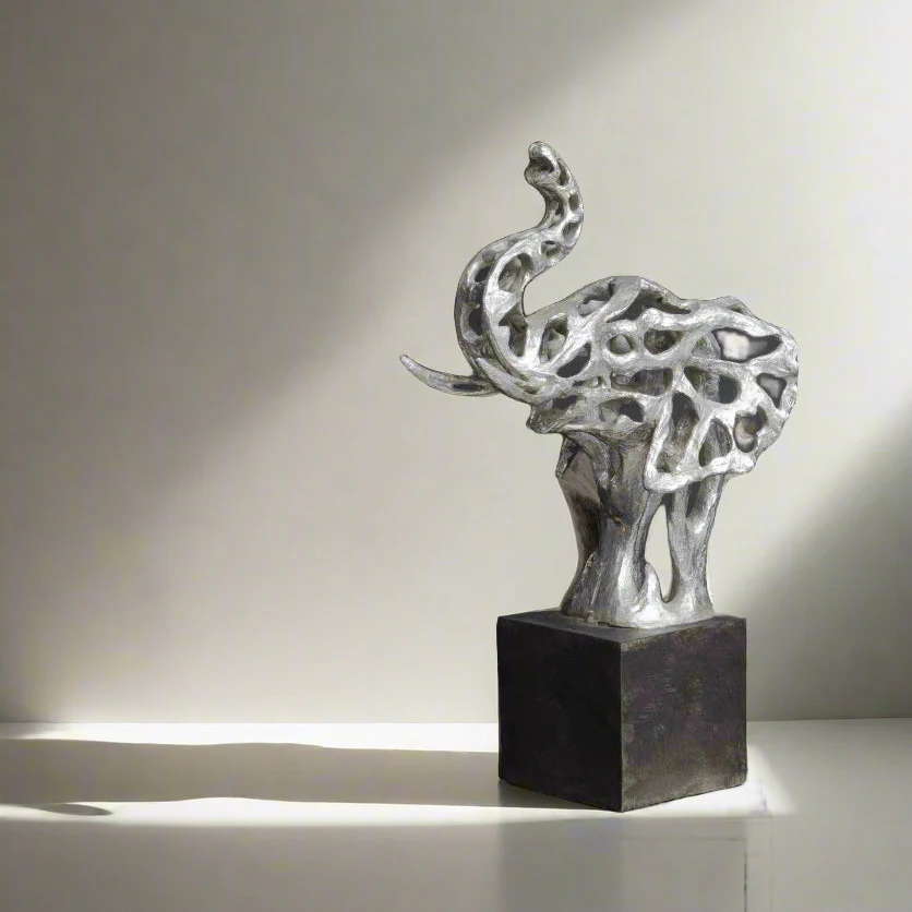 Silver Elephant Head Sculpture on Black Plinth �C Contemporary Resin Artwork