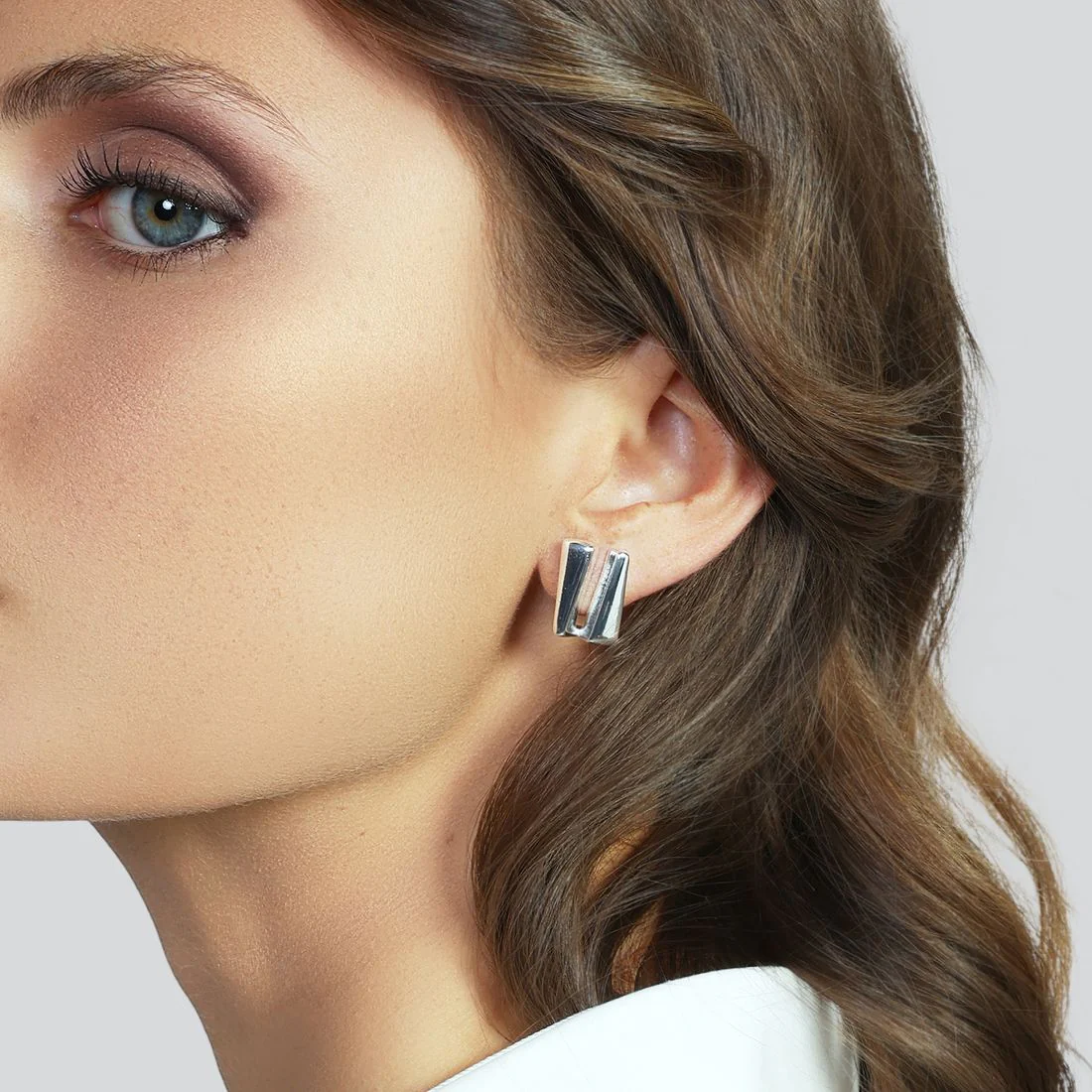 Orecchini Unoaerre a lobo mini dorati Dinamica argentati 2785