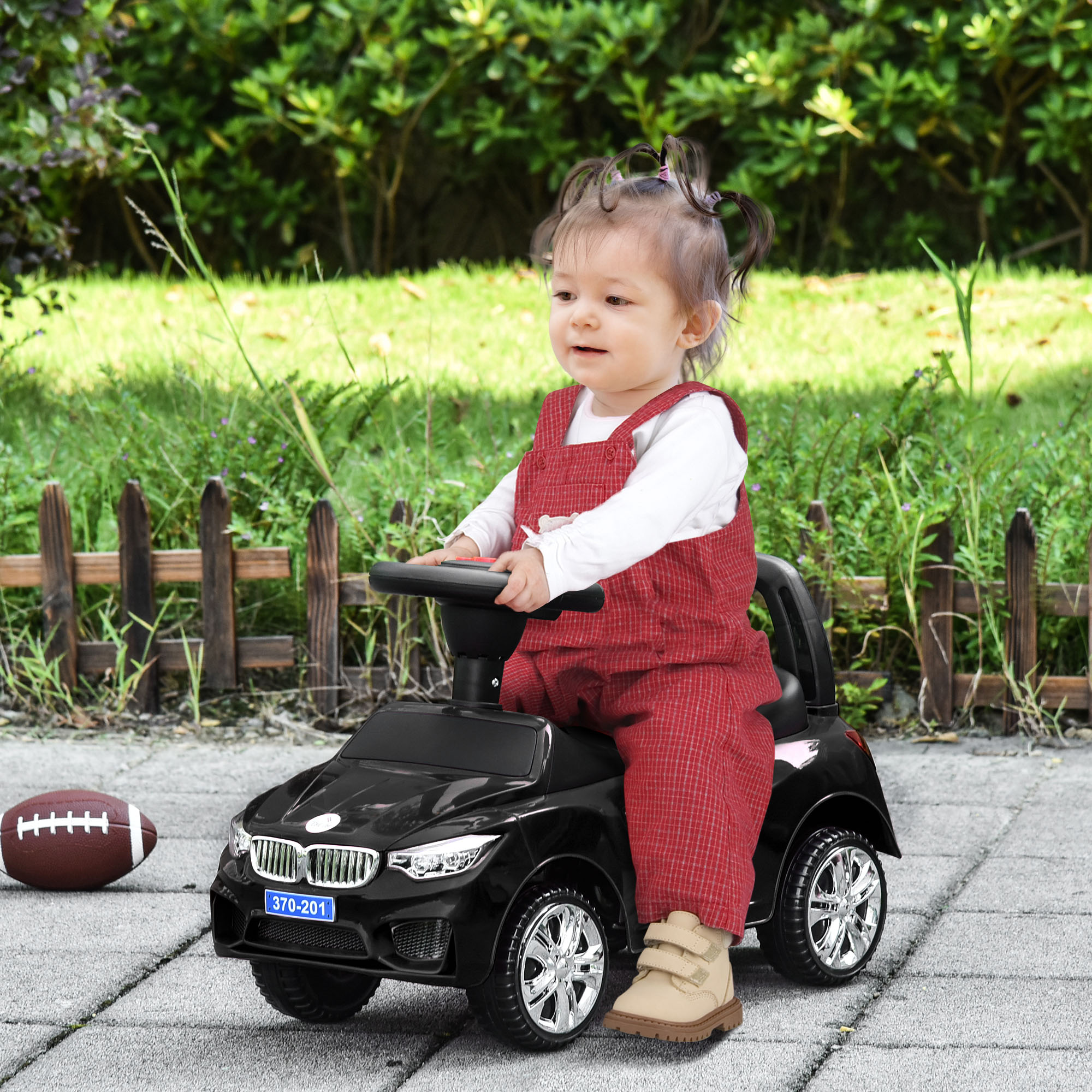 HOMCOM Kinderreitauto mit Lenkrad, Scheinwerfern und integrierter Musik, aus PP und Metall, 63,5x28x36 cm, Schwarz