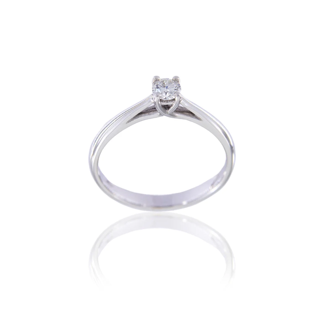 Solitario intreccio a griff  in oro bianco con diamante ct 0,23