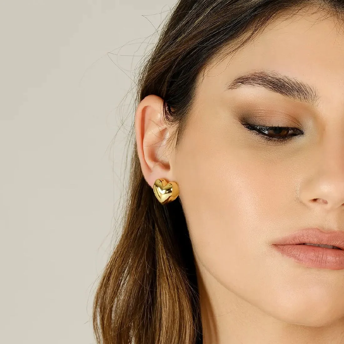Orecchini Amen dorati a forma di cuore bombato ORCUBOGG3