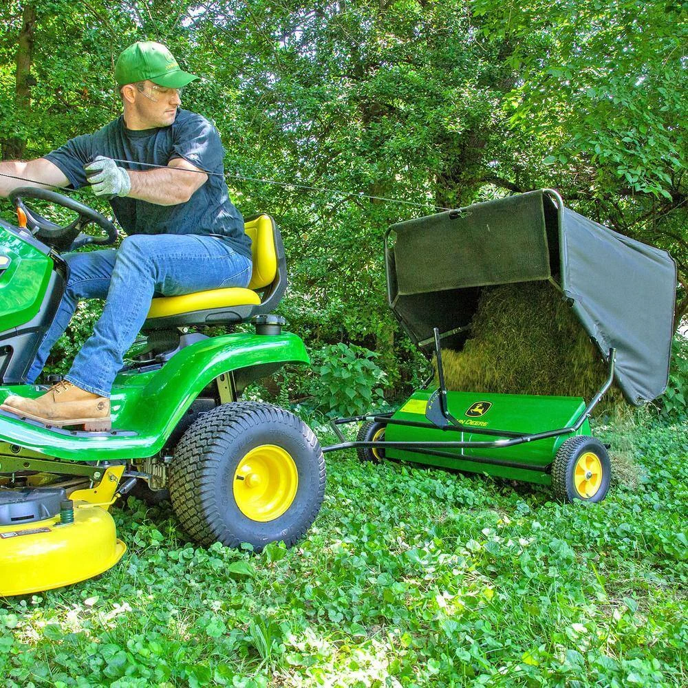 John Deere 42�� trailed lawn sweeper, 24 cubic foot capacity, adjustable brushes