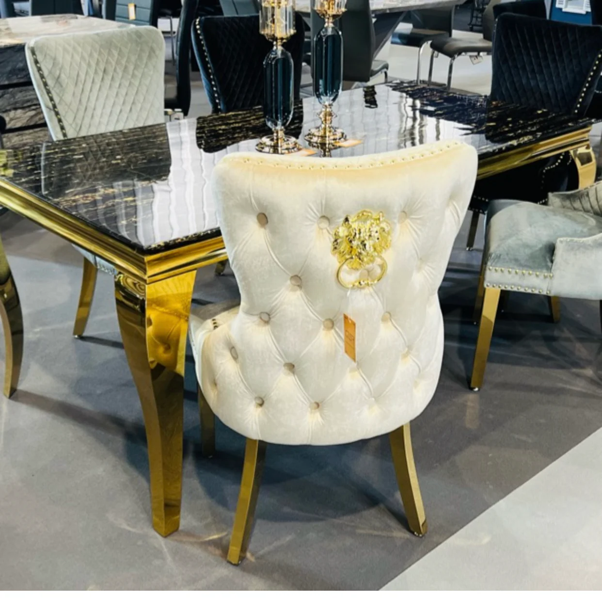 Louis Black And Gold Table With Black Victoria Gold Lion Knocker Chairs