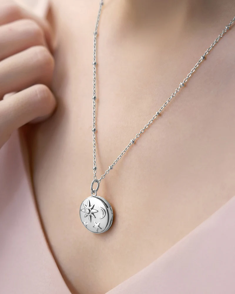 Newbridge Silverware | Amy Huberman Silver  Locket with Sun, Moon and Stars