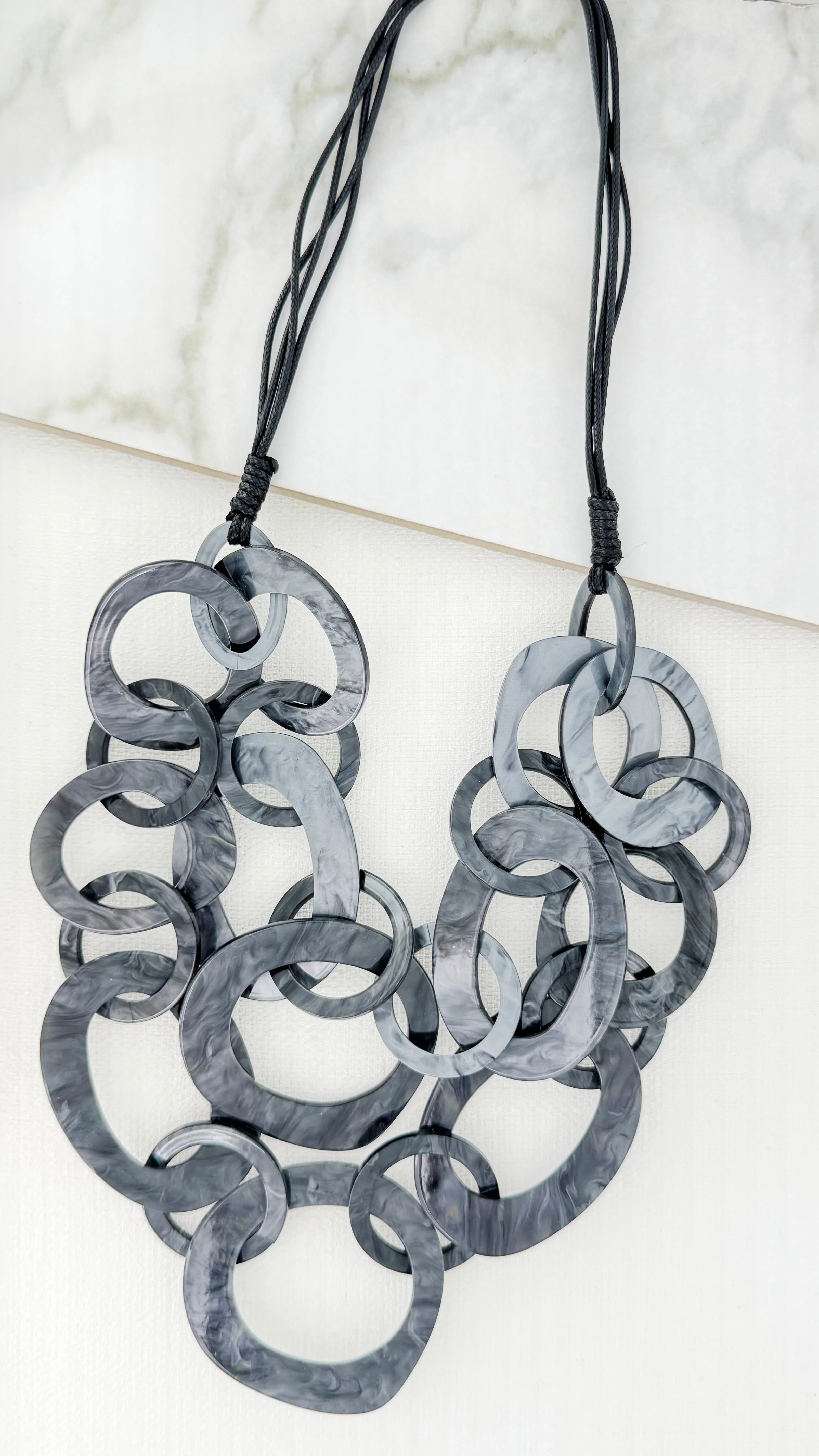 Envy Long Grey Multi Looped Resin Necklace