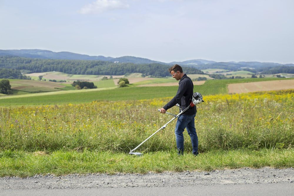 IKRA Benzin Freischneider Trimmer IBF 25-1 inkl. Fadenspule, 4-Zahn-Messer & Schultergurt