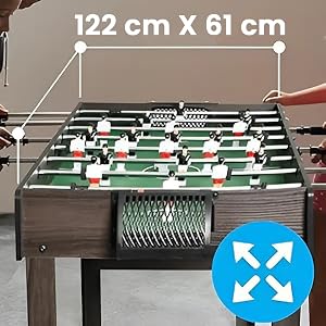 Biliardino da 122 cm x 61 cm, con struttura in legno, superficie di gioco verde e figure di giocatori bianche. L'icona blu indica una visualizzazione espandibile