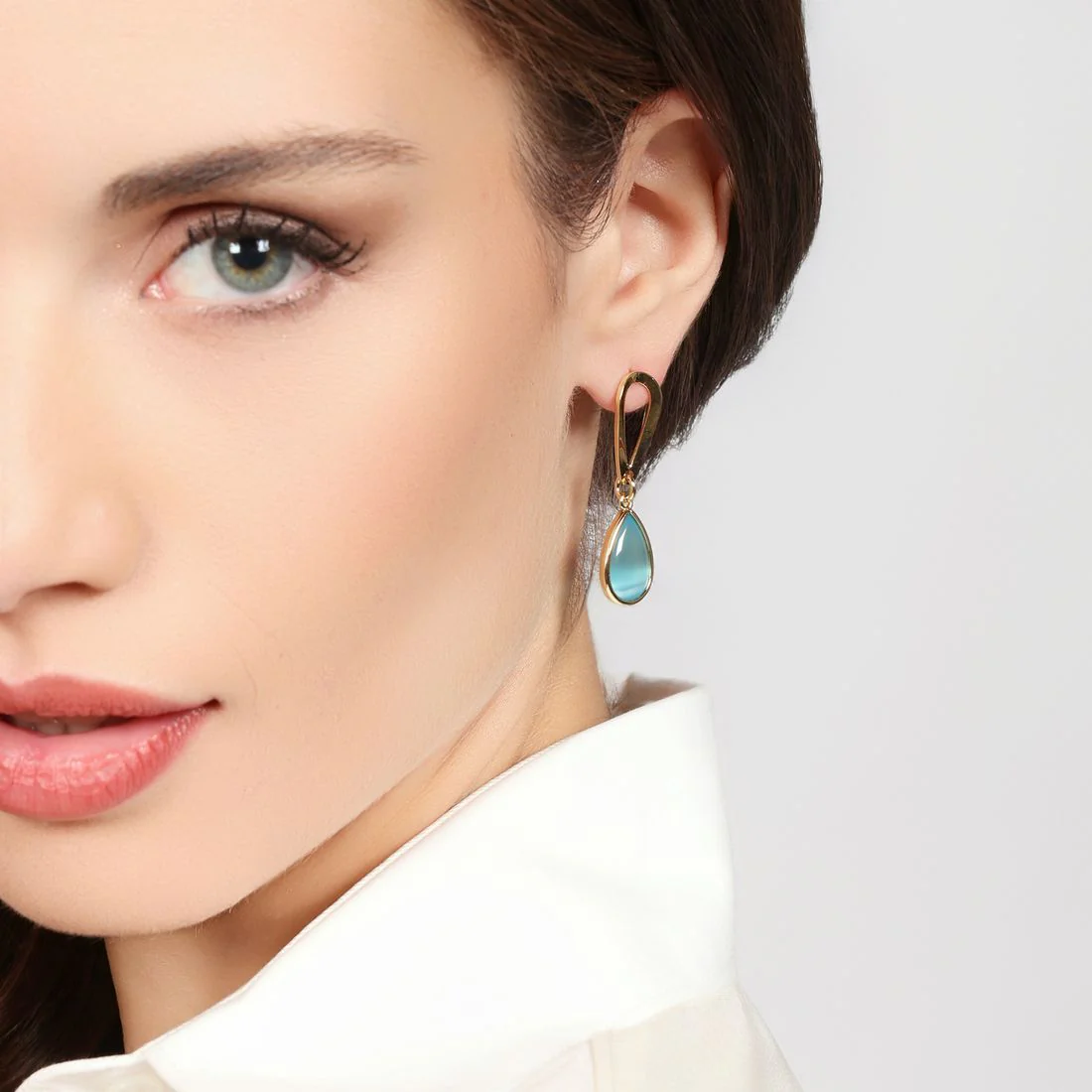 Orecchini Unoaerre Joya con goccia azzurra dorati 2841