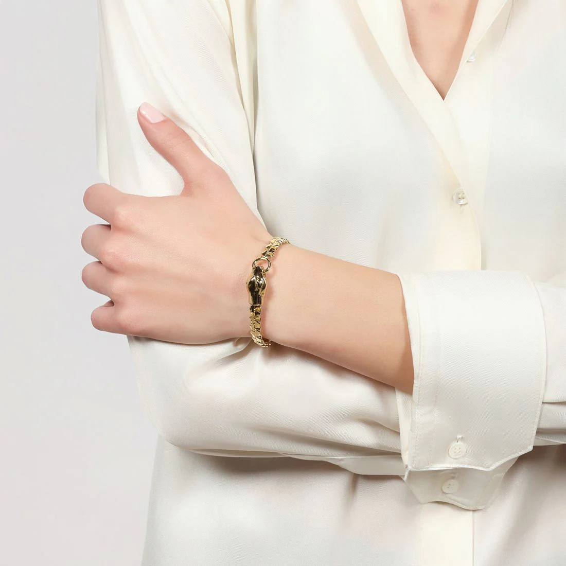 Bracciale Unoaerre con testa di serpente dorato 2851