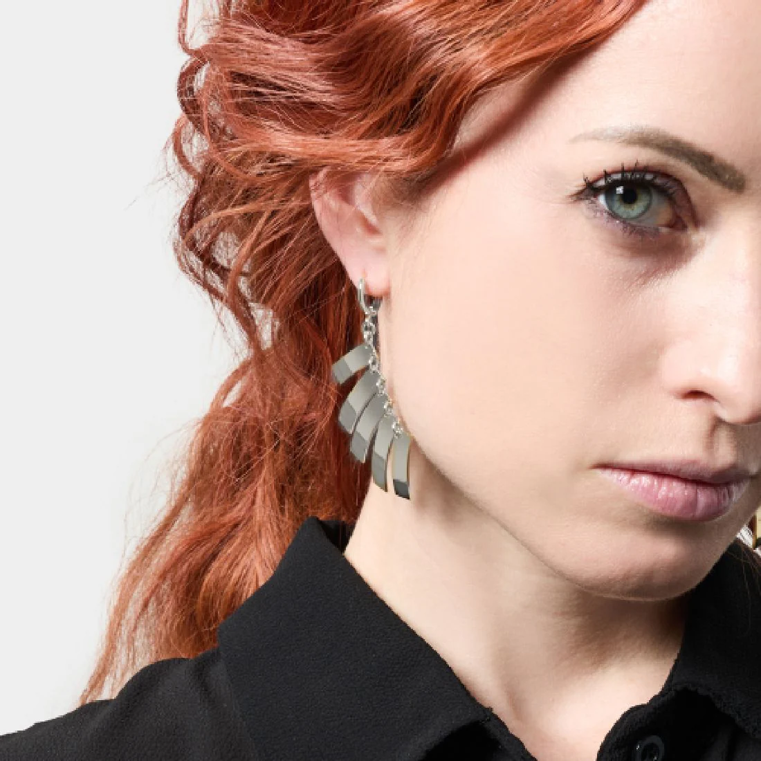 Orecchini pendenti Unoaerre lastrine rettangolari a spina di pesce 2684