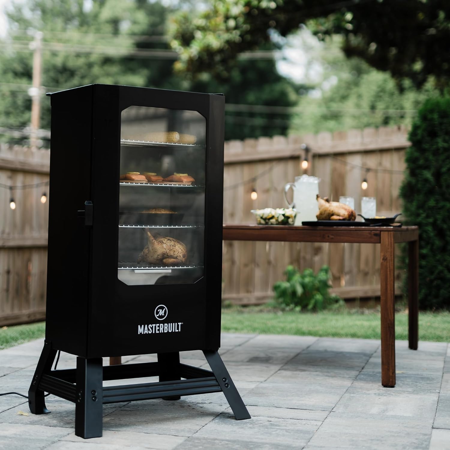 Masterbuilt® 30-inch Digital Electric Vertical BBQ Smoker with Leg Kit  Side Wood Chip Loader and 710 Cooking Square Inches in Black  Model MB20070421