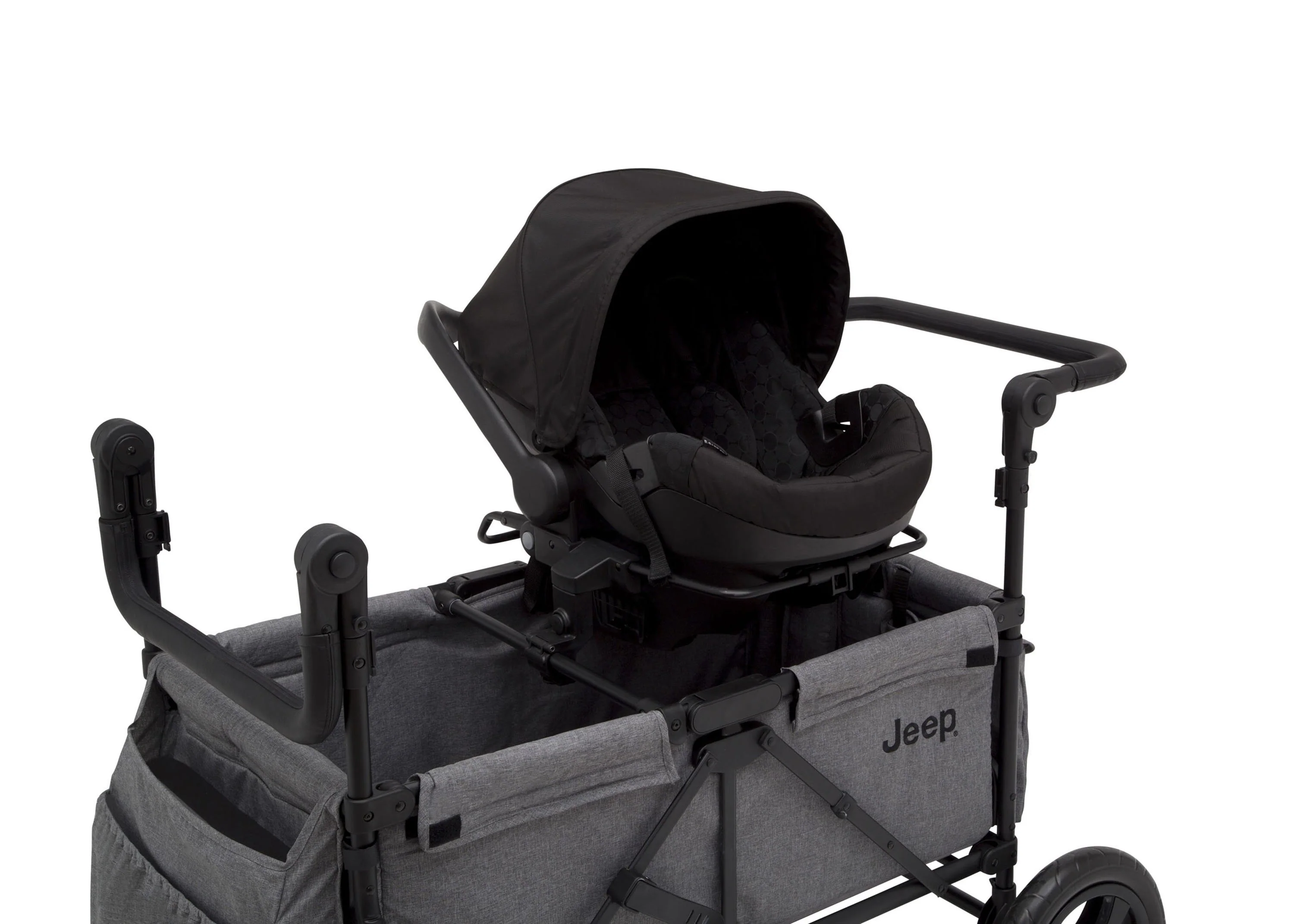 2025 Jeep Wrangler Stroller Wagon de Delta Children – 3 Modos: Portabebés, Cochecito y Carrito, Suspensión, Capota UV, Compatible con Sillas de Auto, Almacenamiento Múltiple, Manillares Ajustables