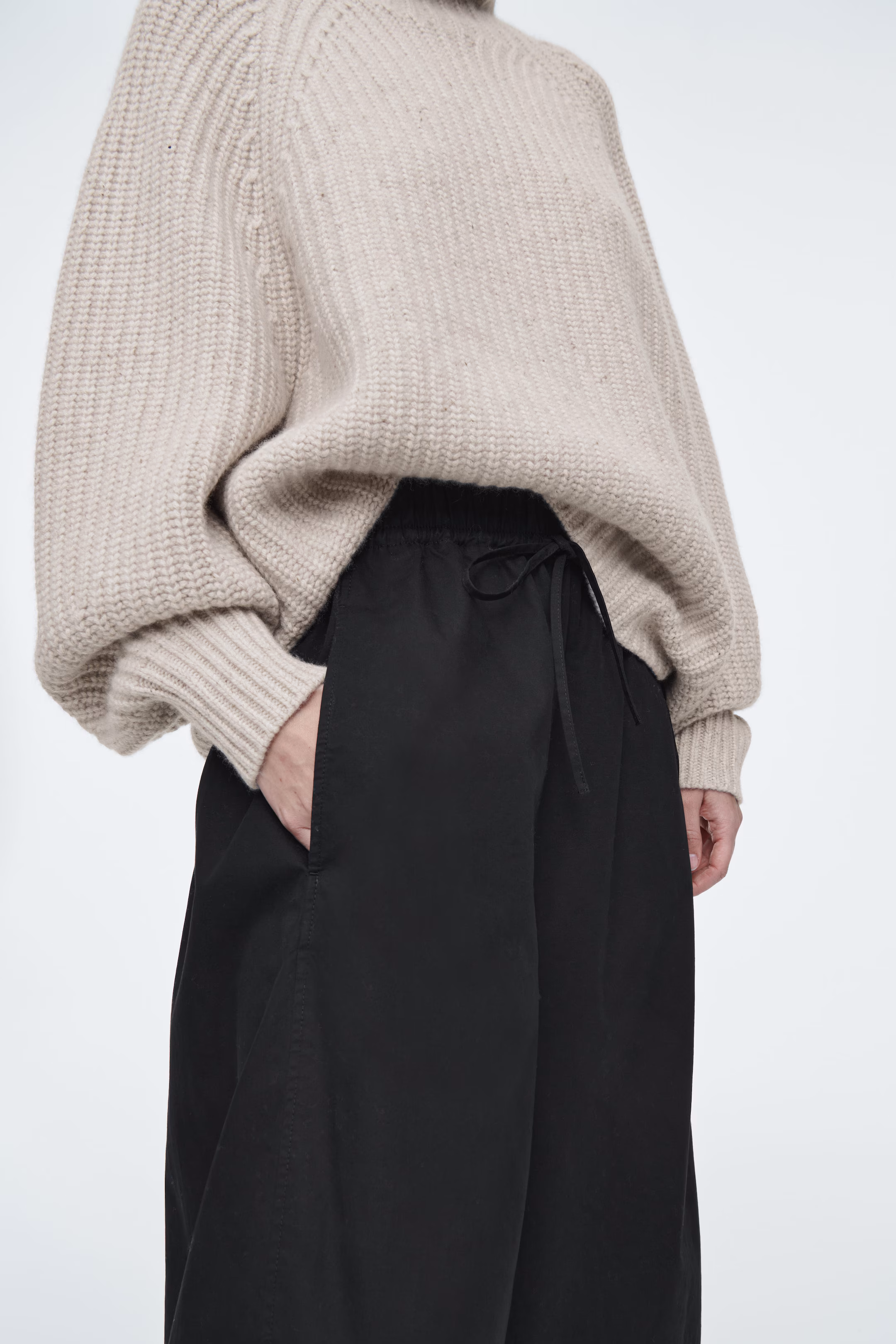 ELASTICATED BARREL-LEG TROUSERS