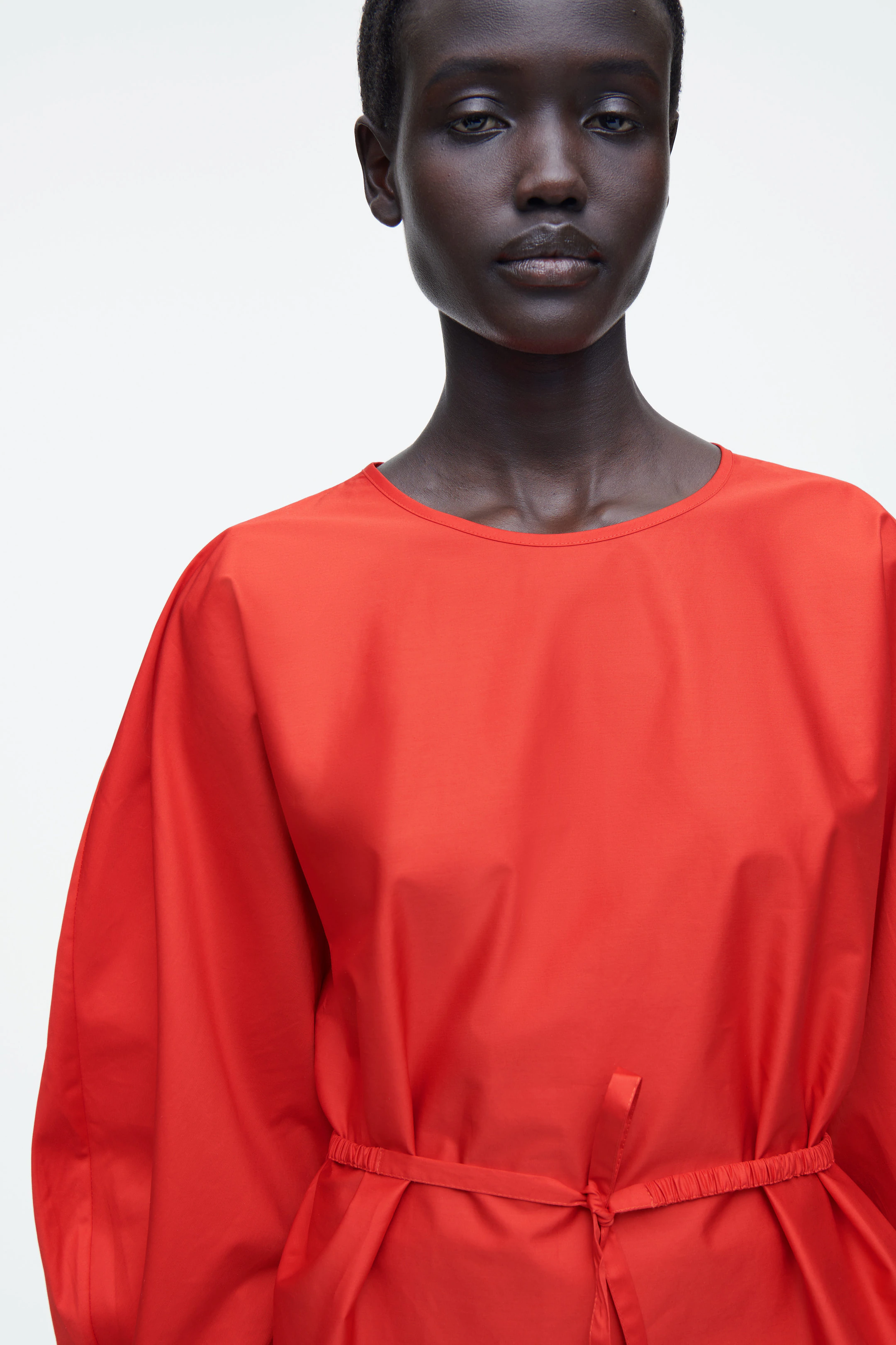 DRAWSTRING PEPLUM BLOUSE