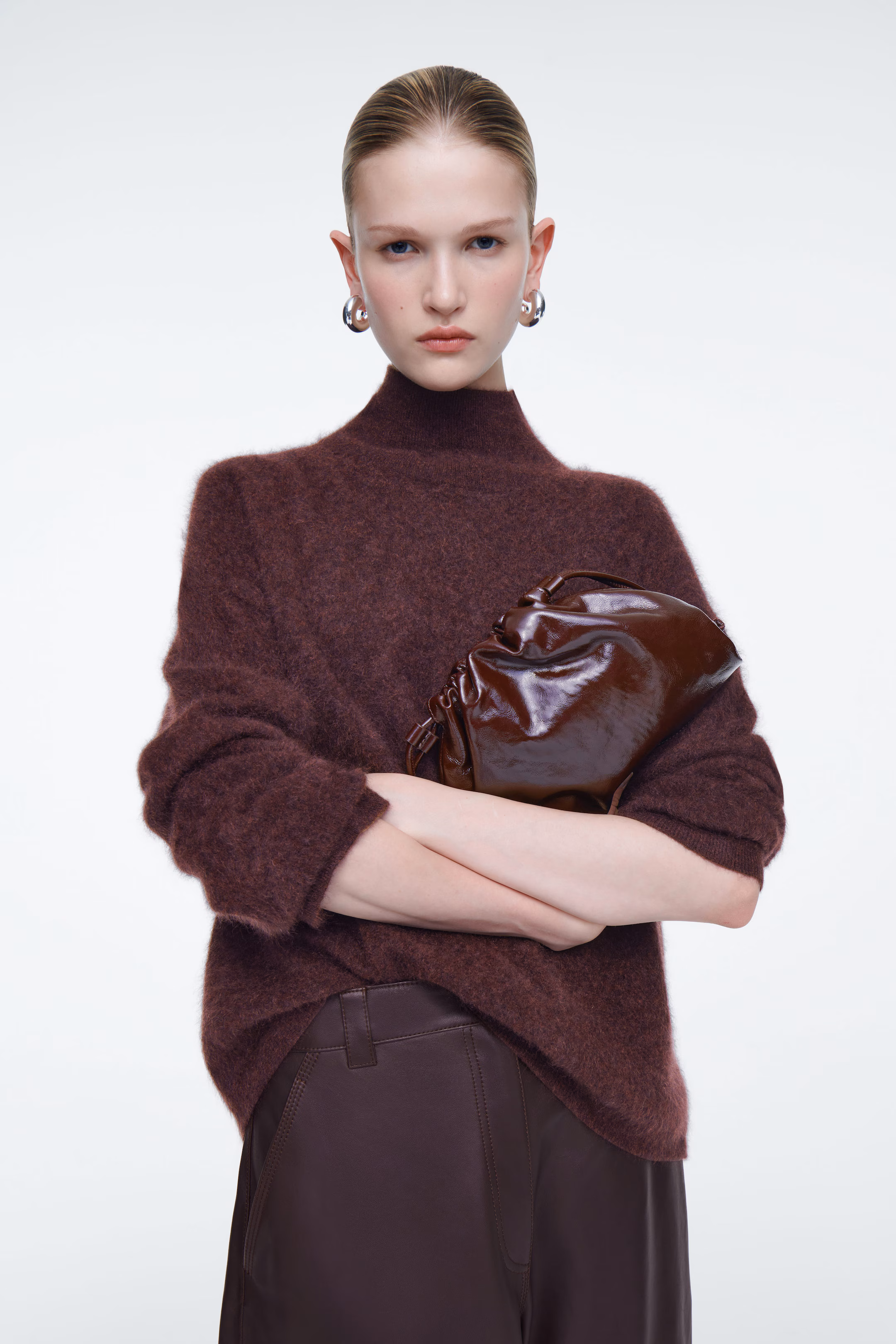MINI CAVATELLI CLUTCH BAG - LEATHER