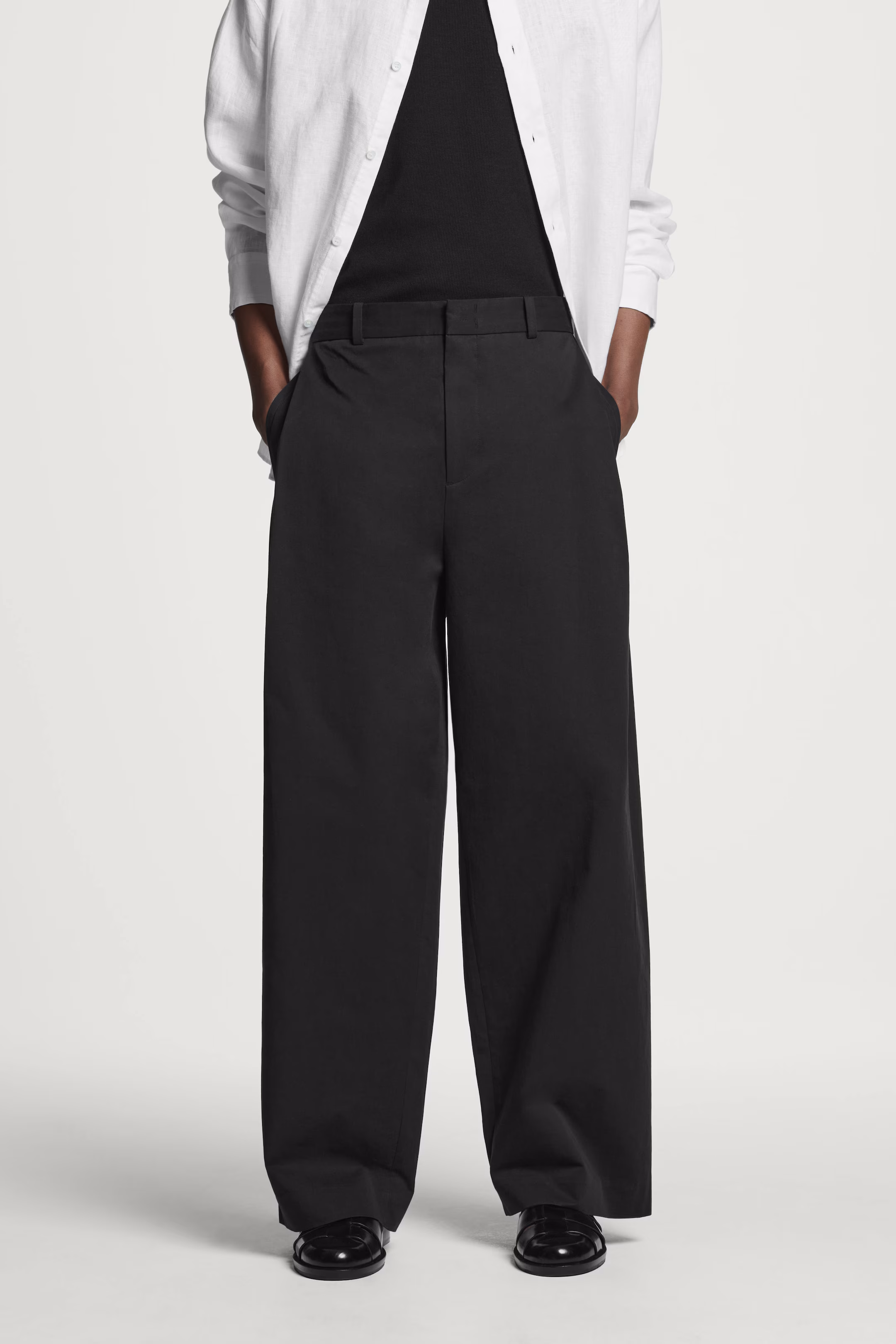 PLEATED COTTON WIDE-LEG TROUSERS