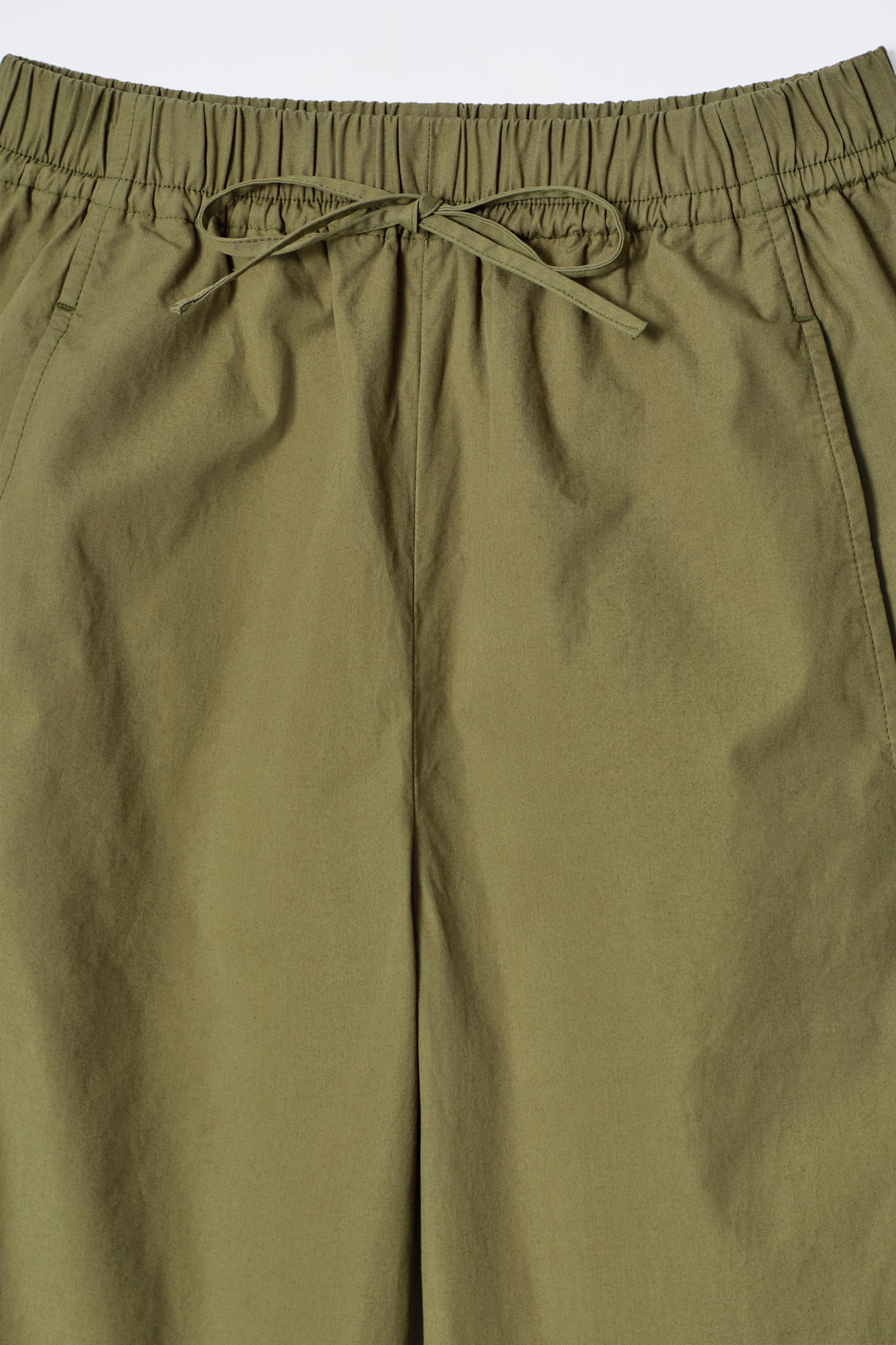 ELASTICATED BARREL-LEG TROUSERS