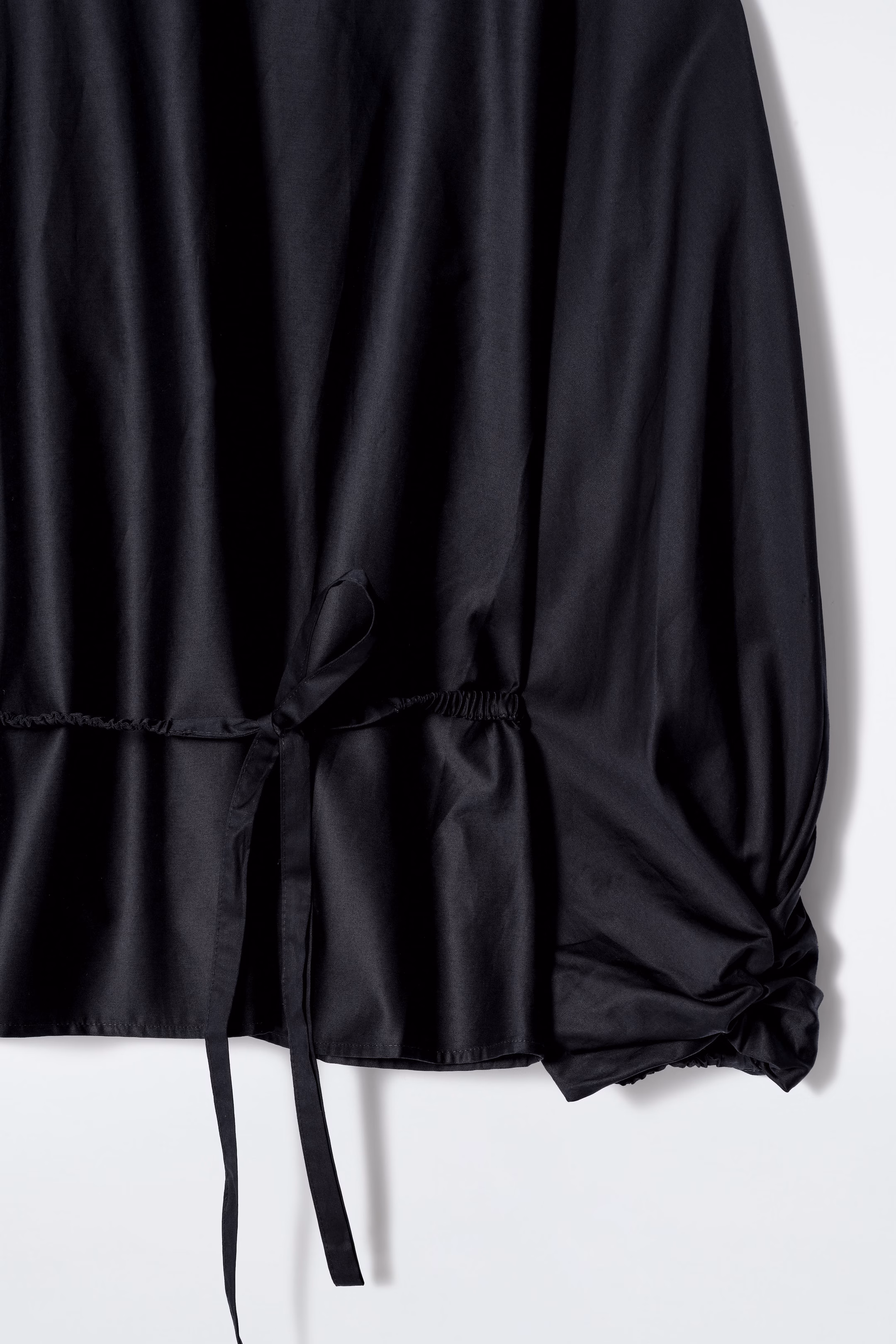 DRAWSTRING PEPLUM BLOUSE