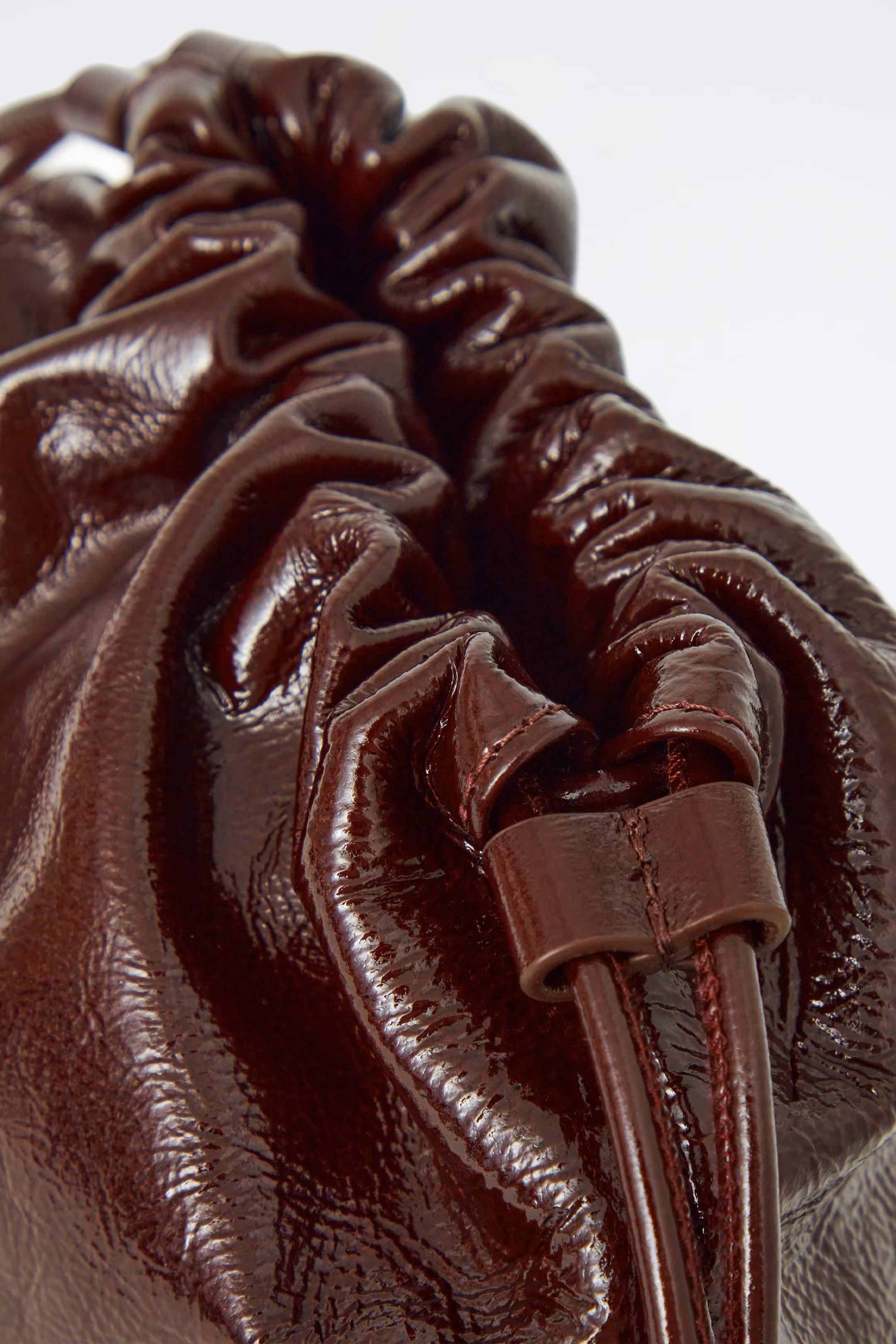 MINI CAVATELLI CLUTCH BAG - LEATHER