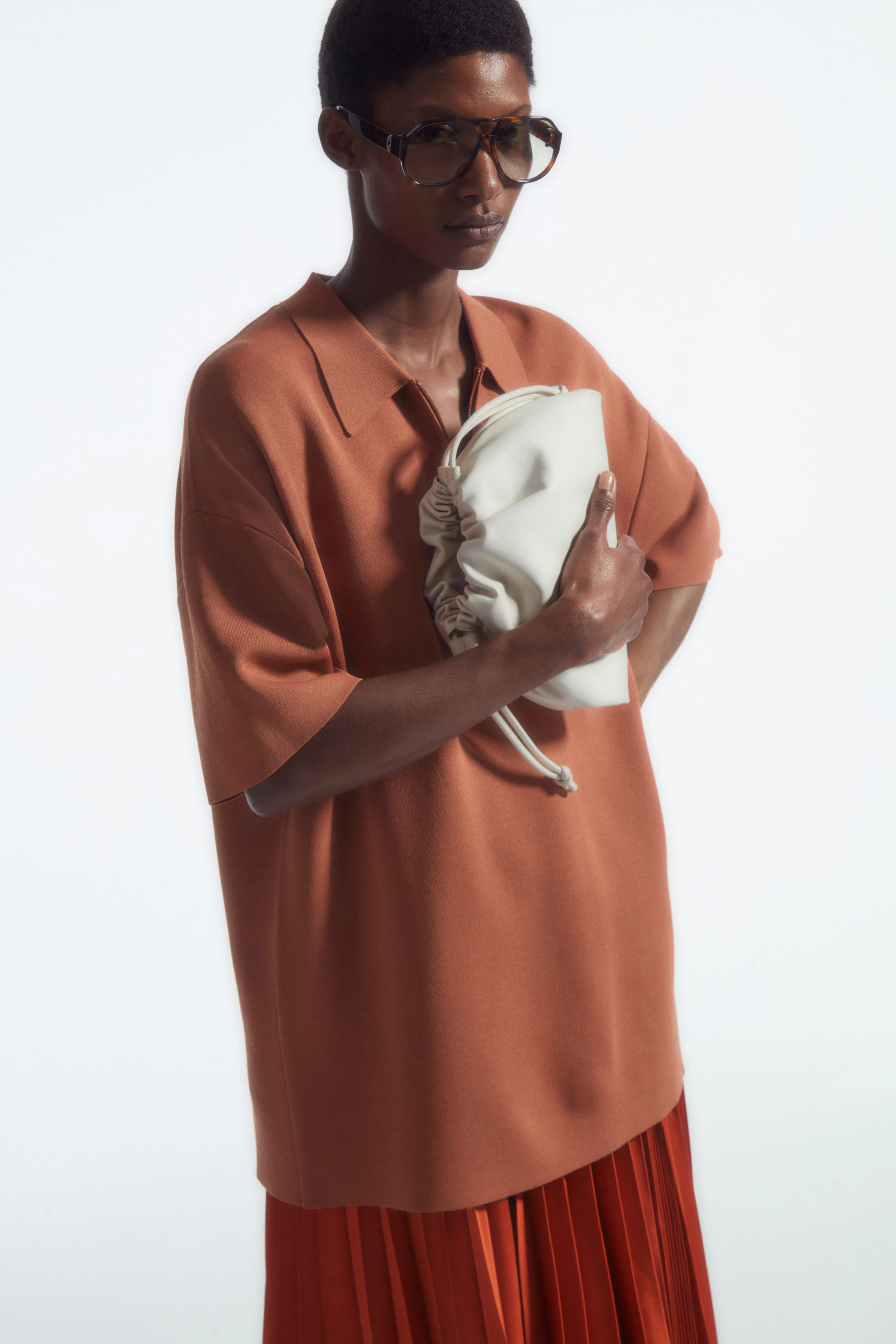 MINI CAVATELLI CLUTCH BAG - LEATHER