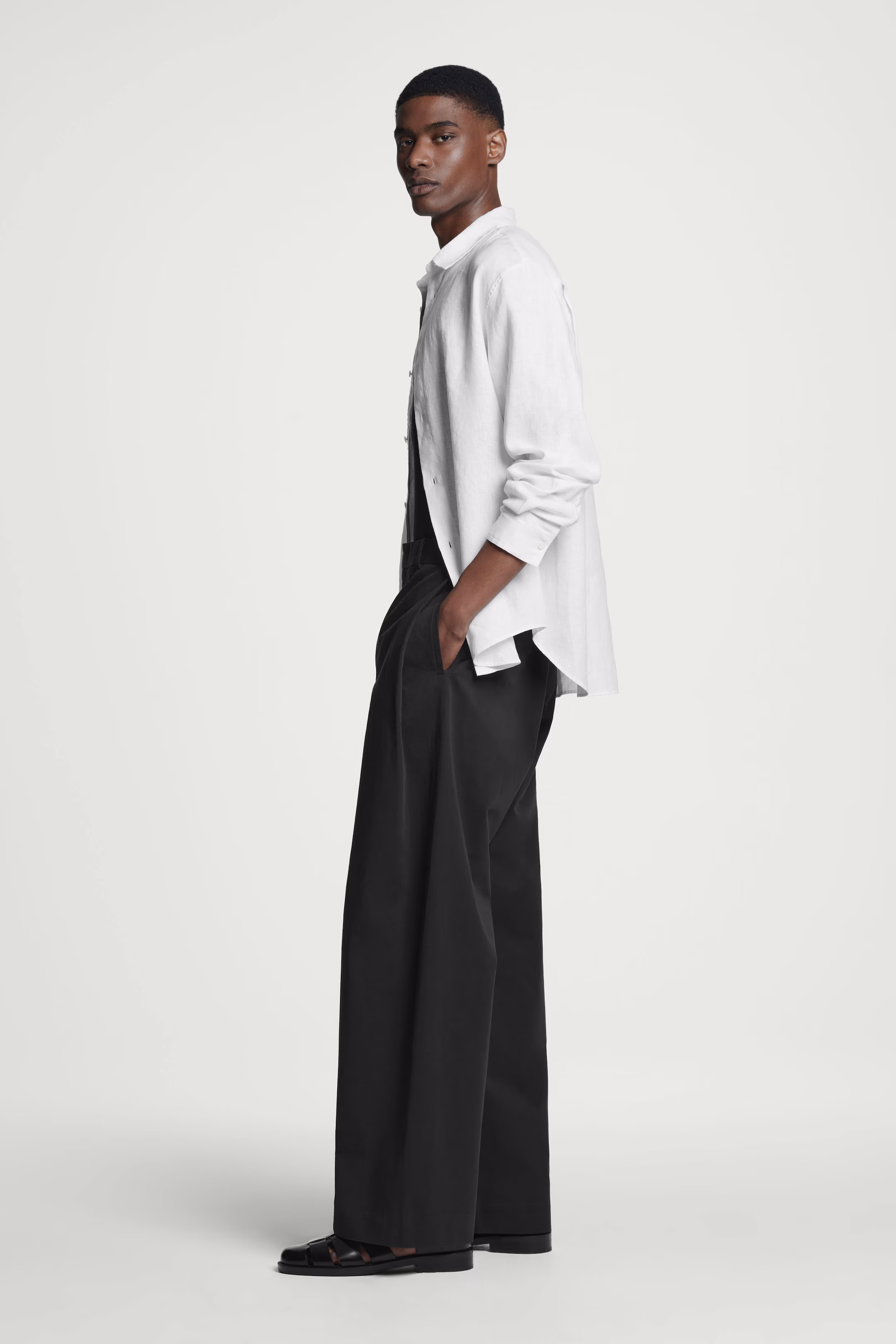 PLEATED COTTON WIDE-LEG TROUSERS