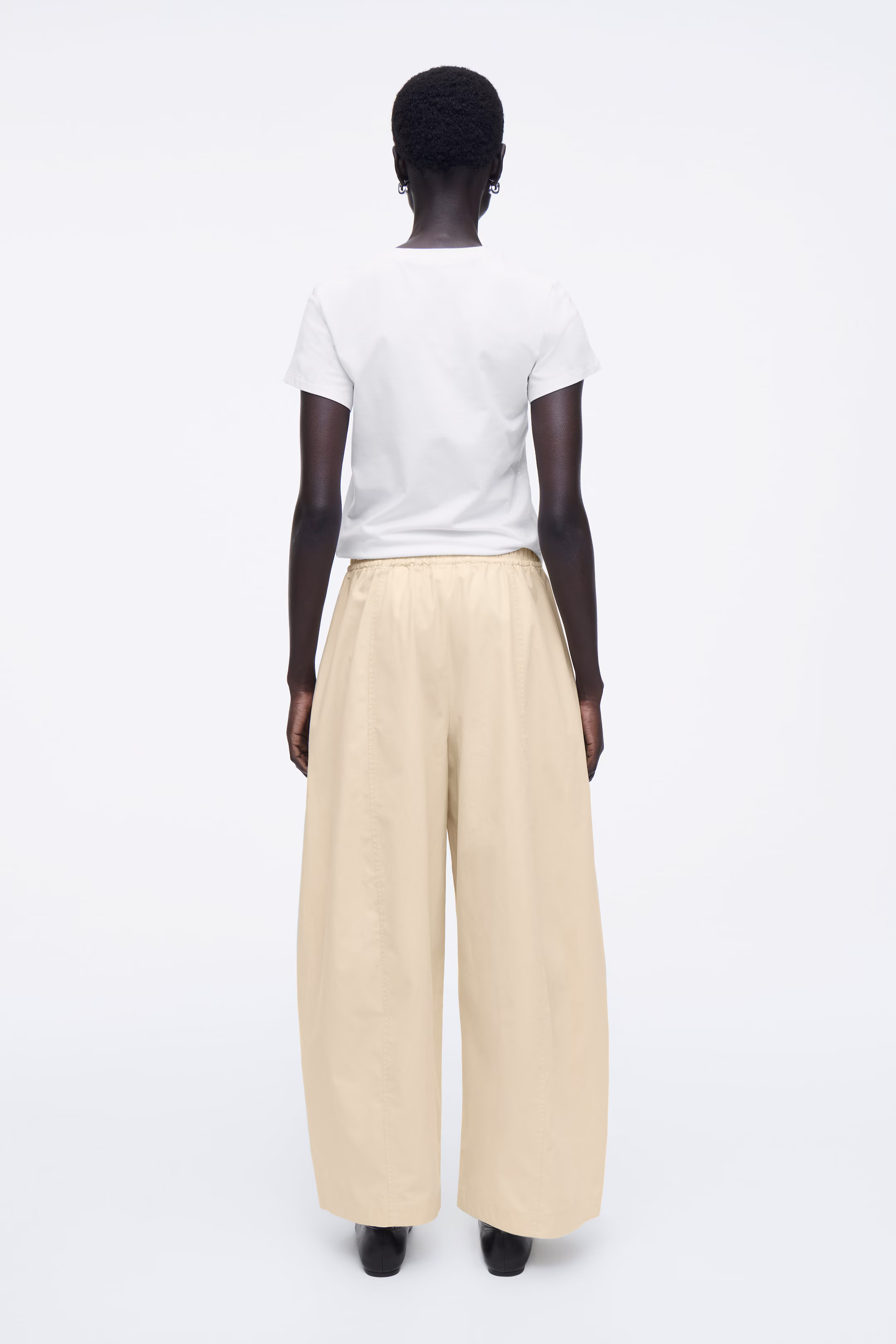 ELASTICATED BARREL-LEG TROUSERS
