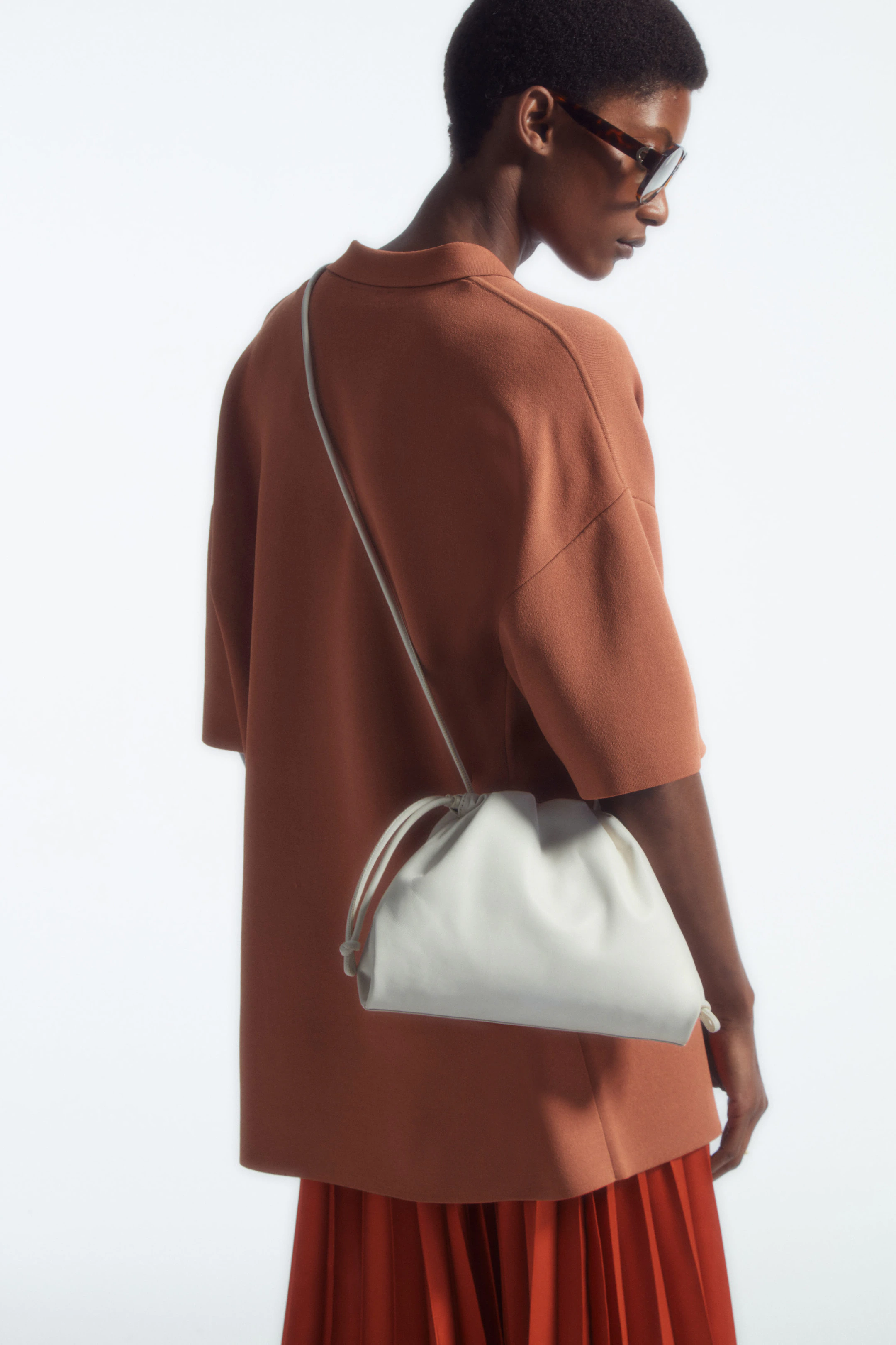 MINI CAVATELLI CLUTCH BAG - LEATHER