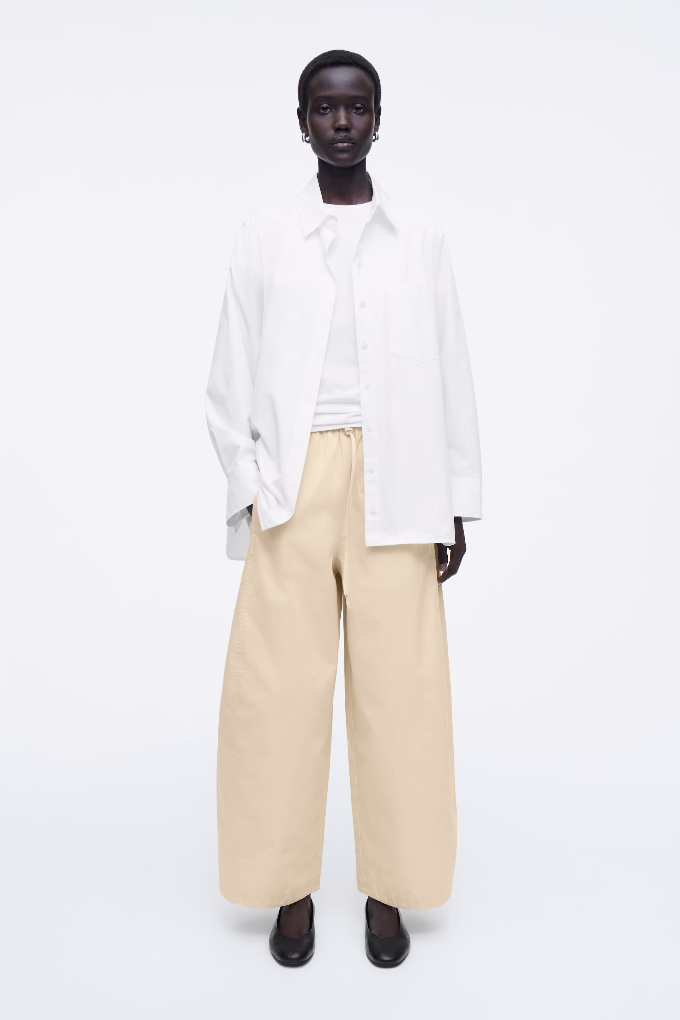 ELASTICATED BARREL-LEG TROUSERS