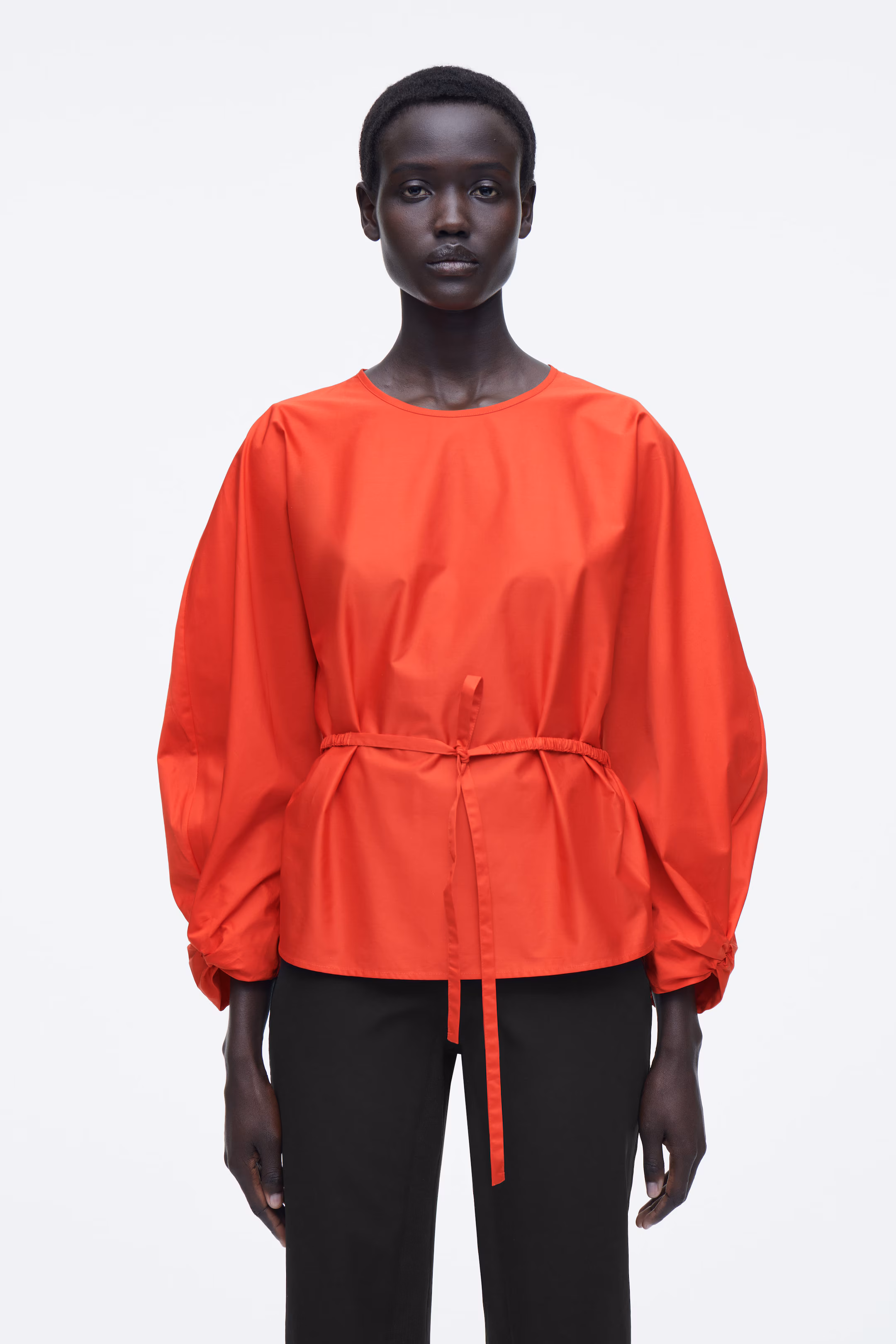 DRAWSTRING PEPLUM BLOUSE