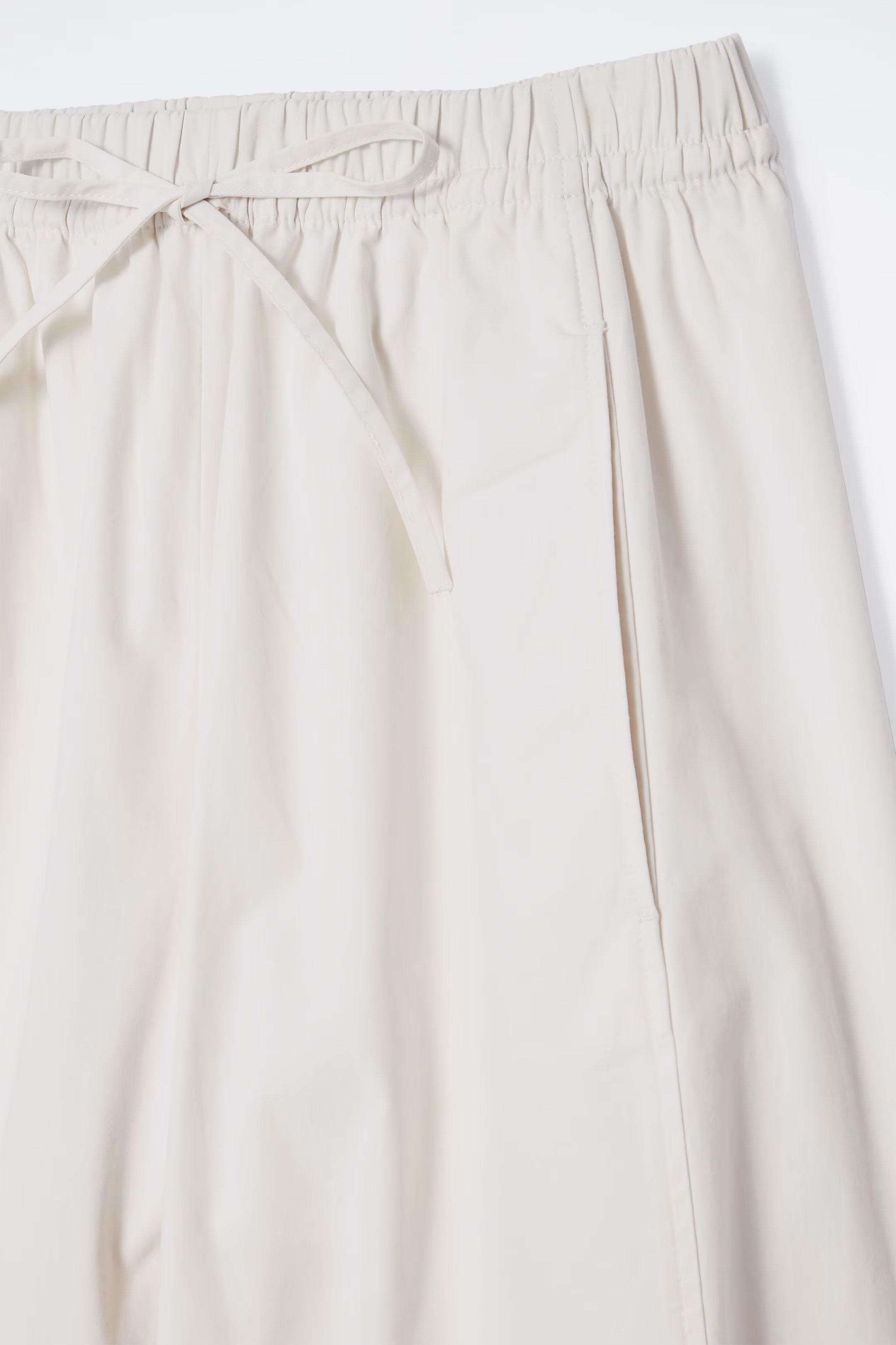ELASTICATED BARREL-LEG TROUSERS