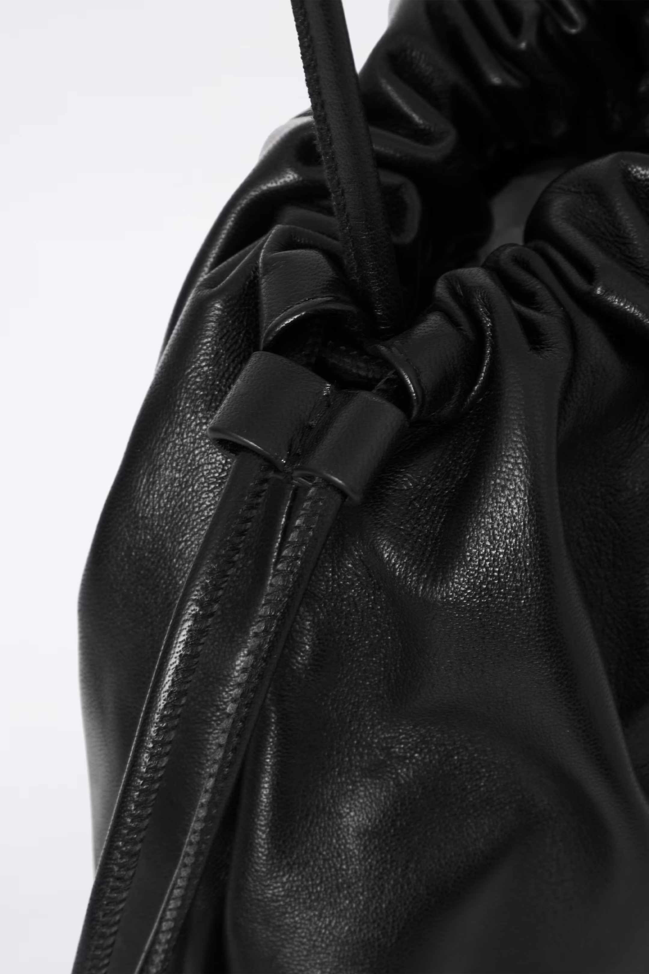 MINI CAVATELLI CLUTCH BAG - LEATHER