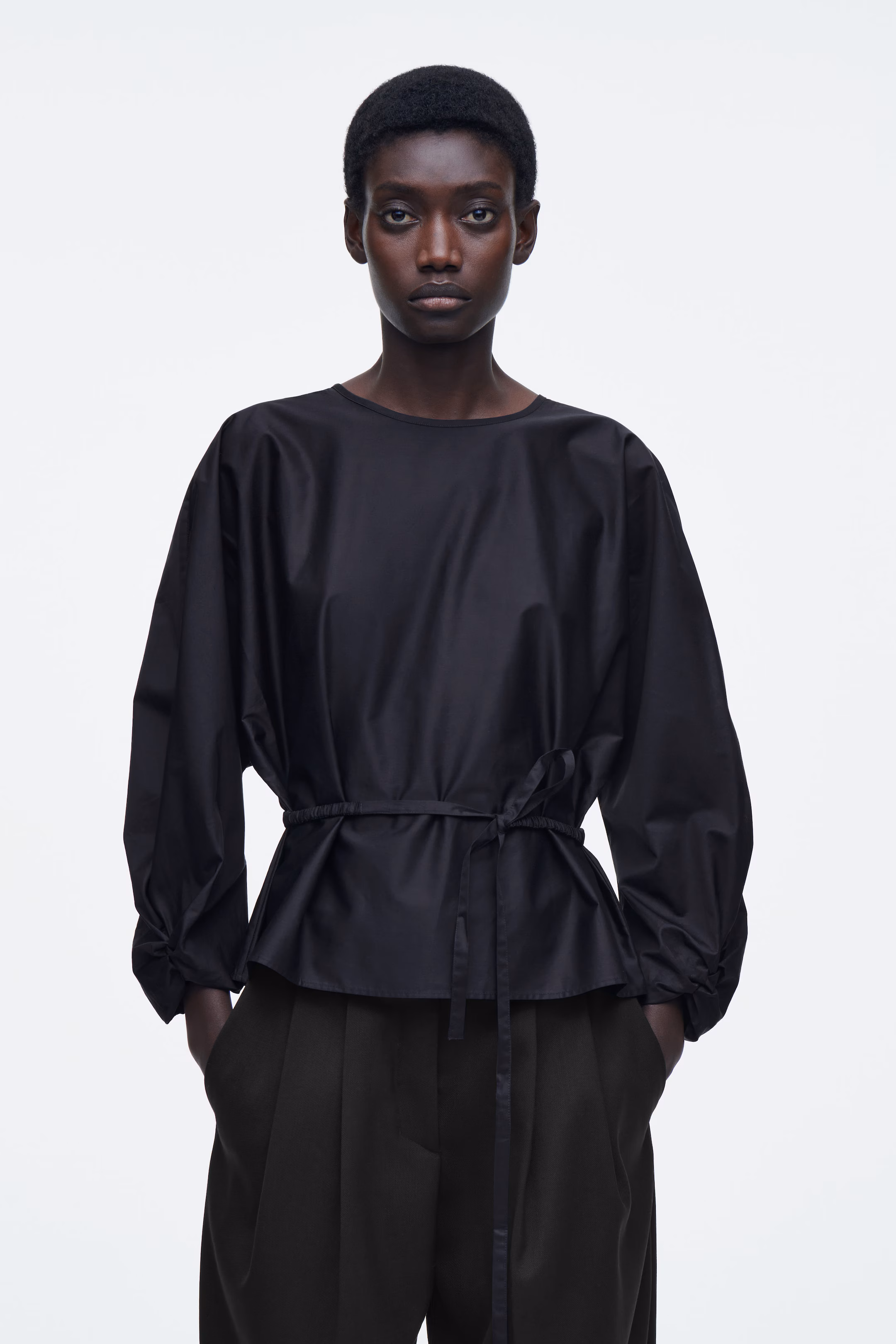 DRAWSTRING PEPLUM BLOUSE