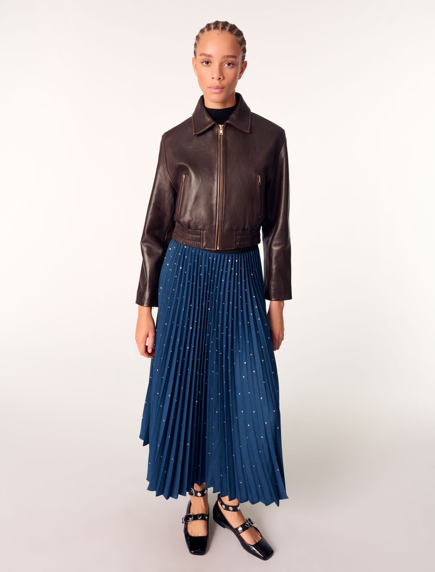 Long pleated skirt with studs