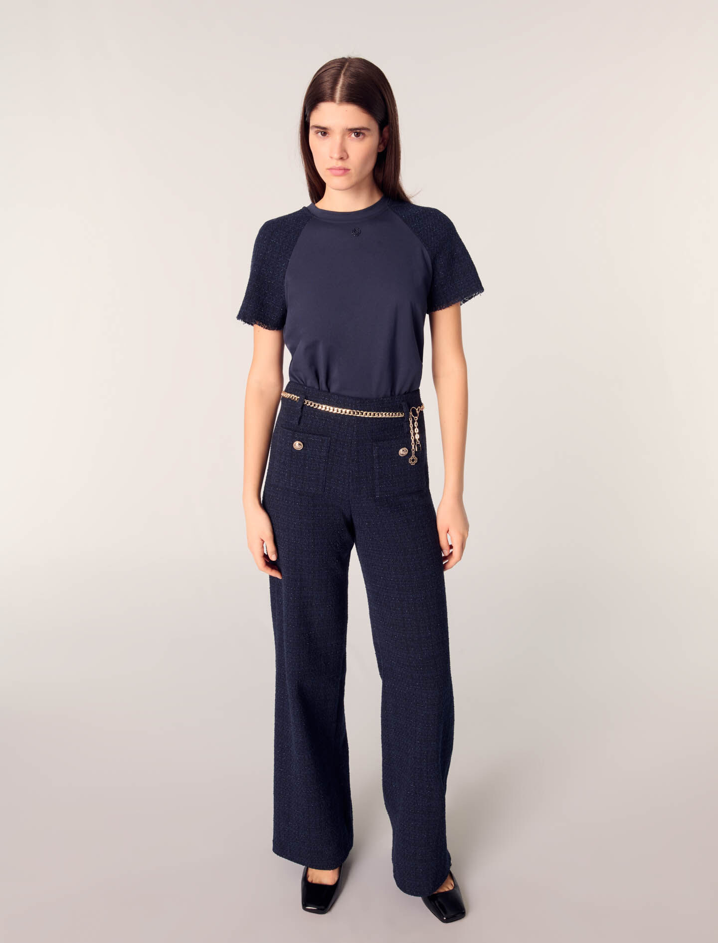 Tweed trousers with chain belt