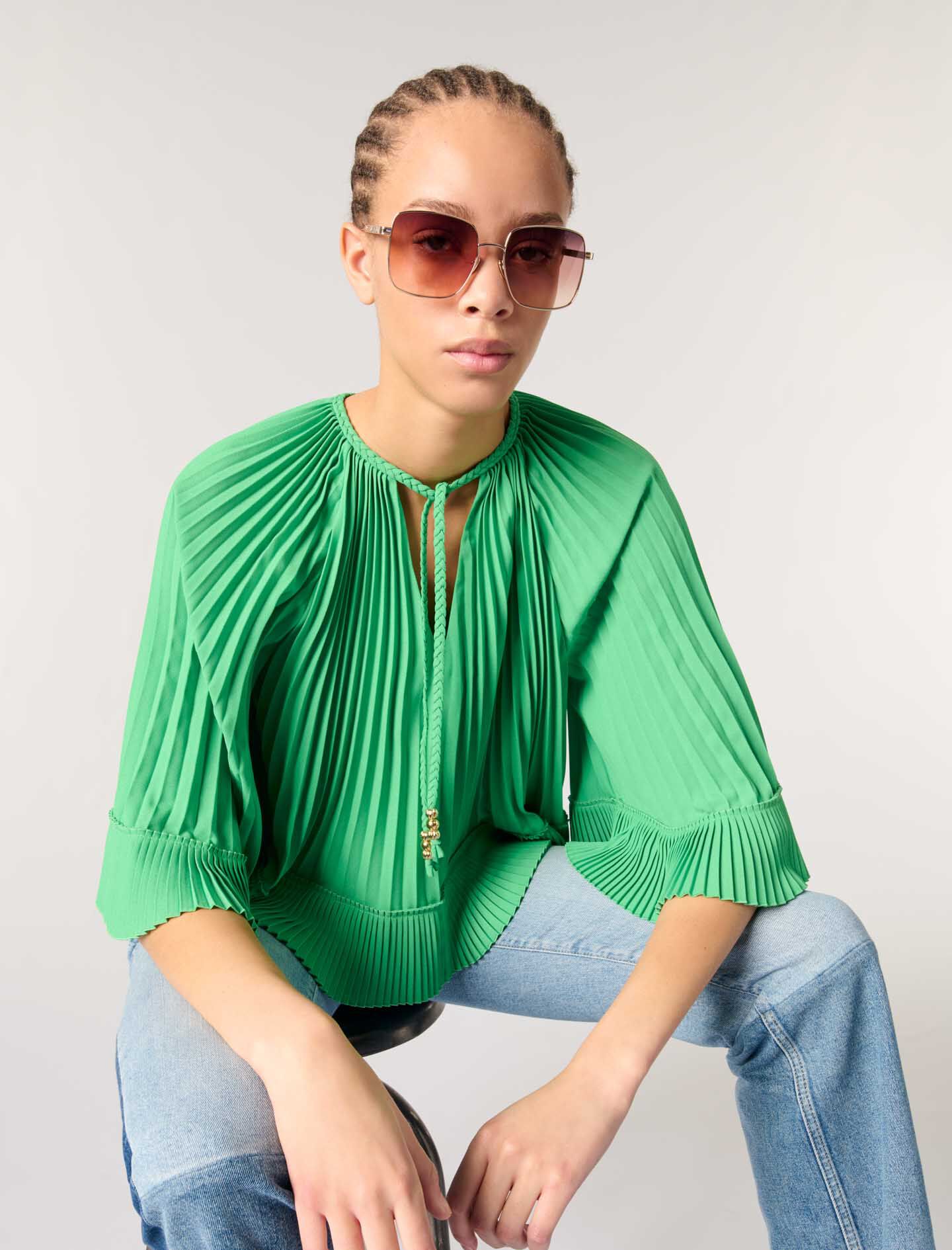Cape-effect pleated top