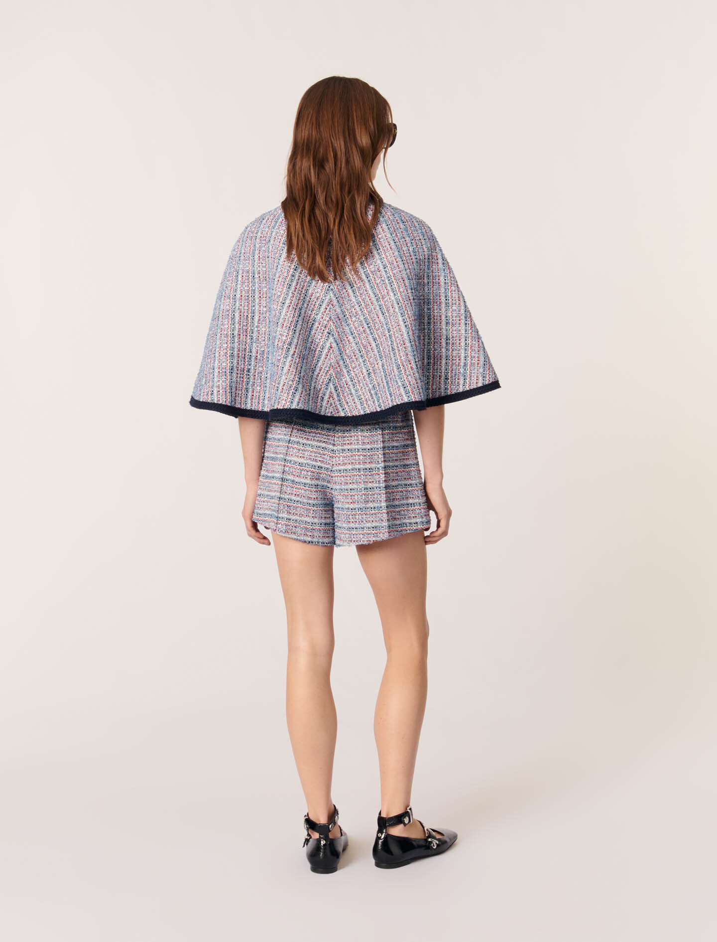 Tweed cape with contrasting trim