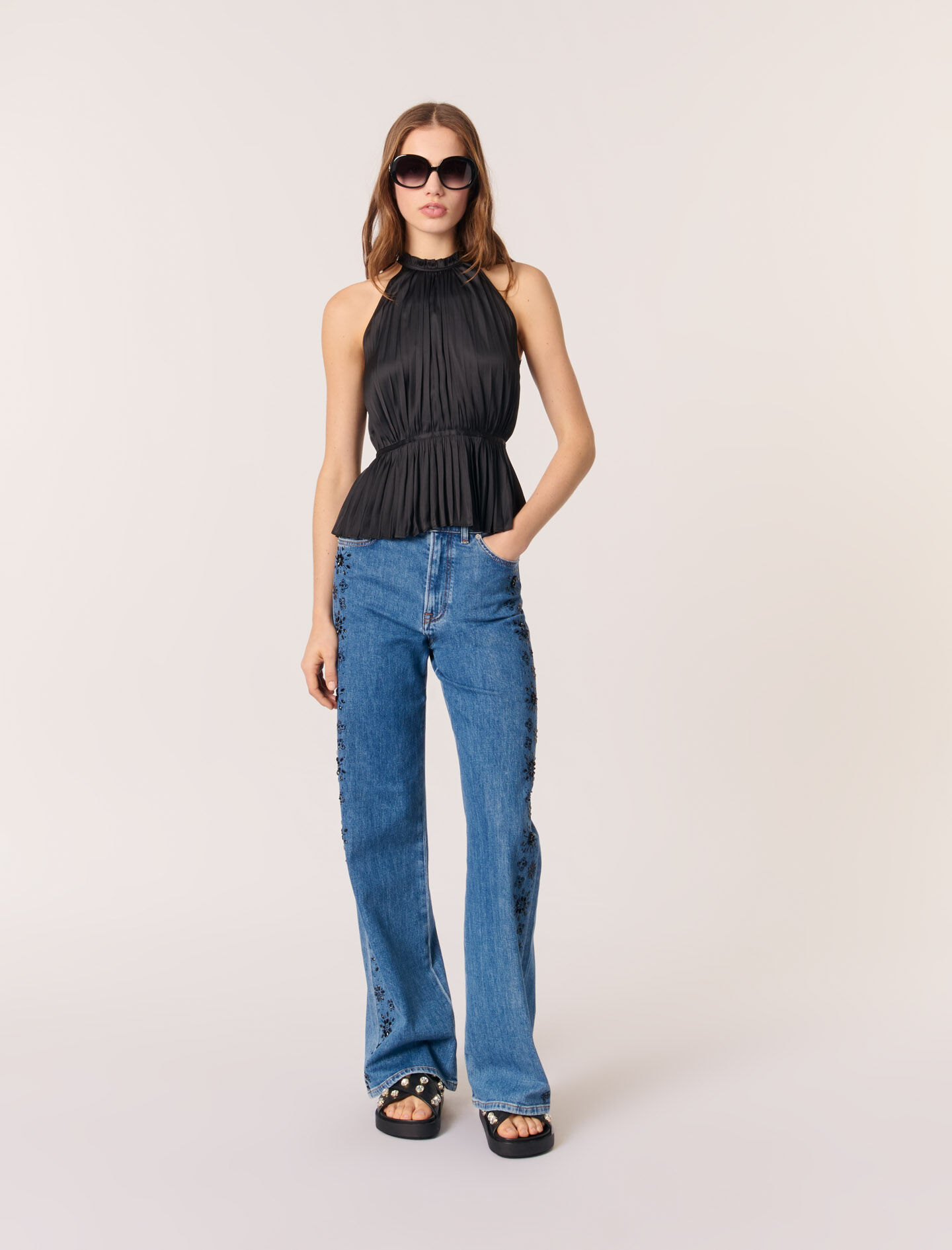 Sleeveless pleated top