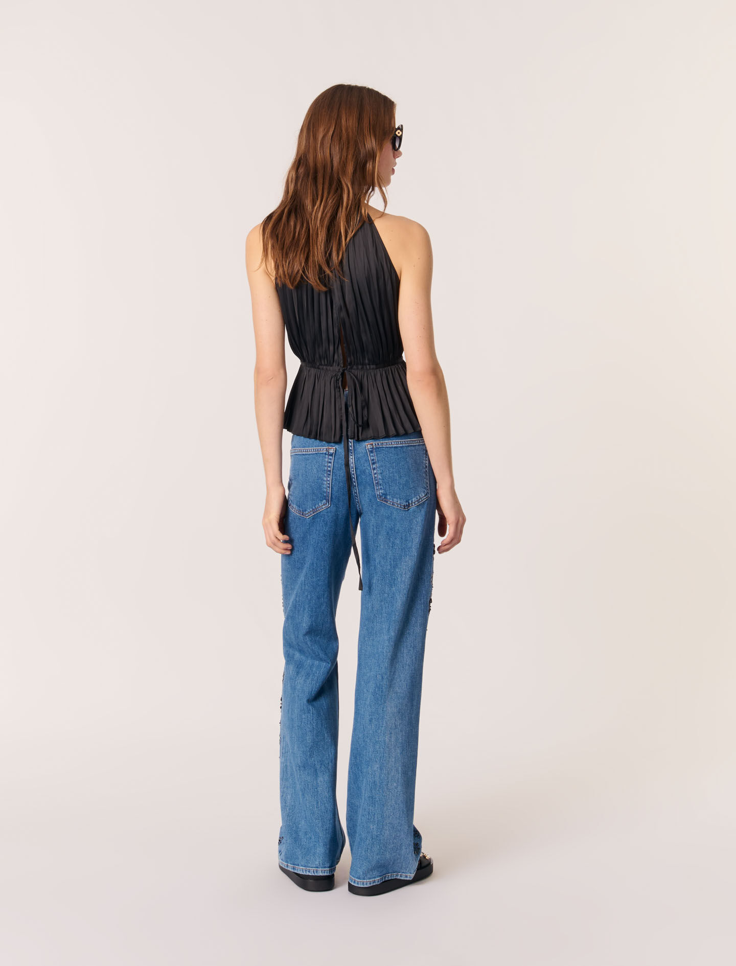 Sleeveless pleated top