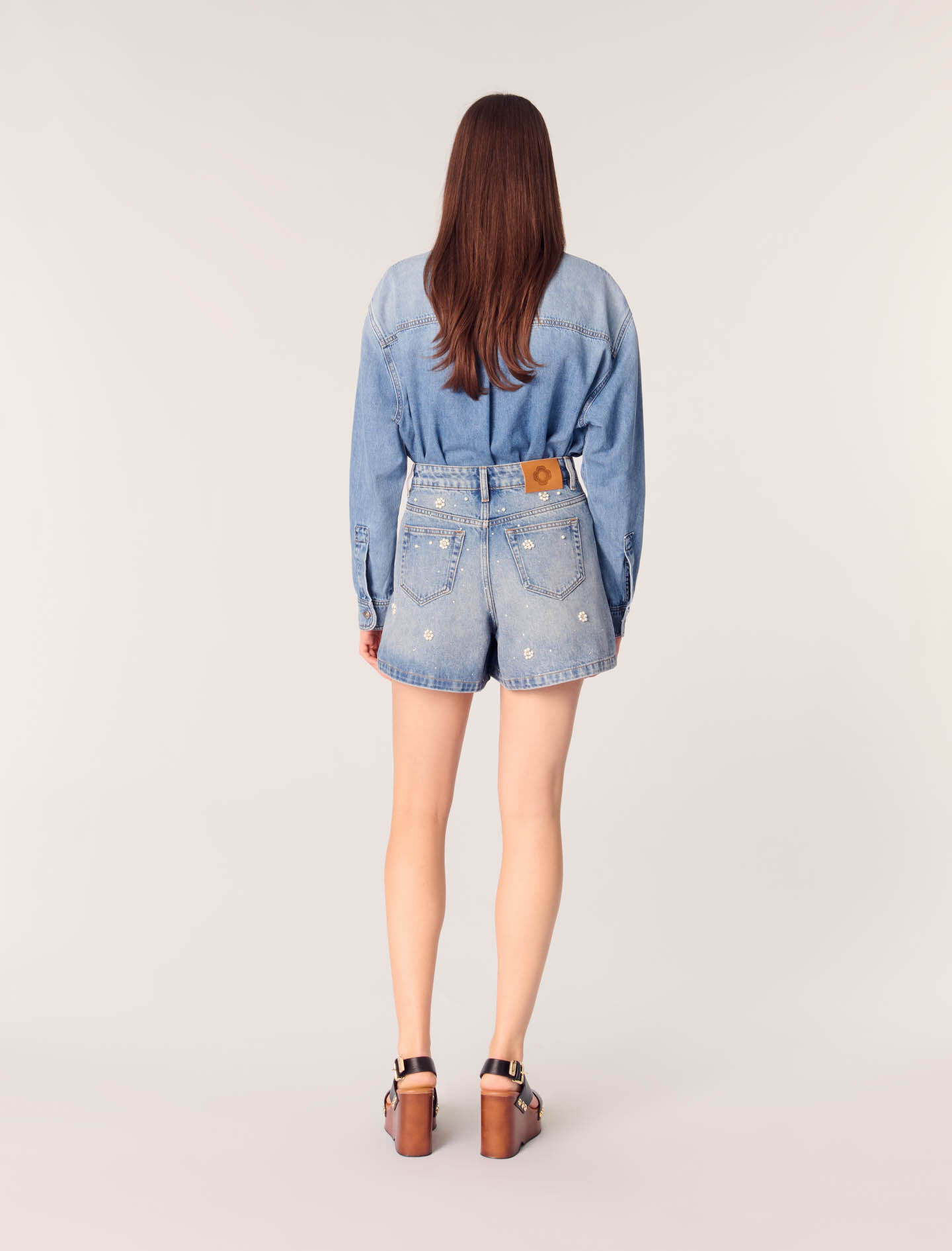 Denim shorts with embroidered beads