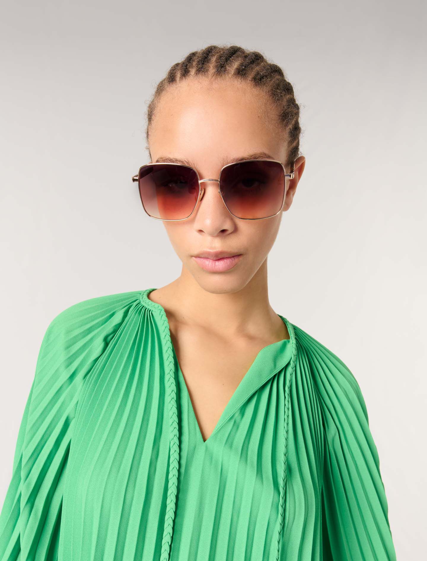 Cape-effect pleated top