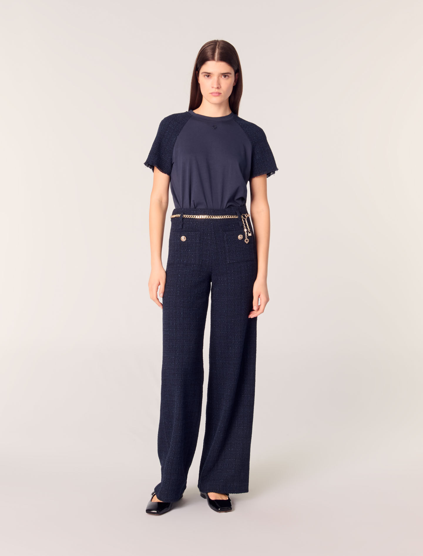 Tweed trousers with chain belt