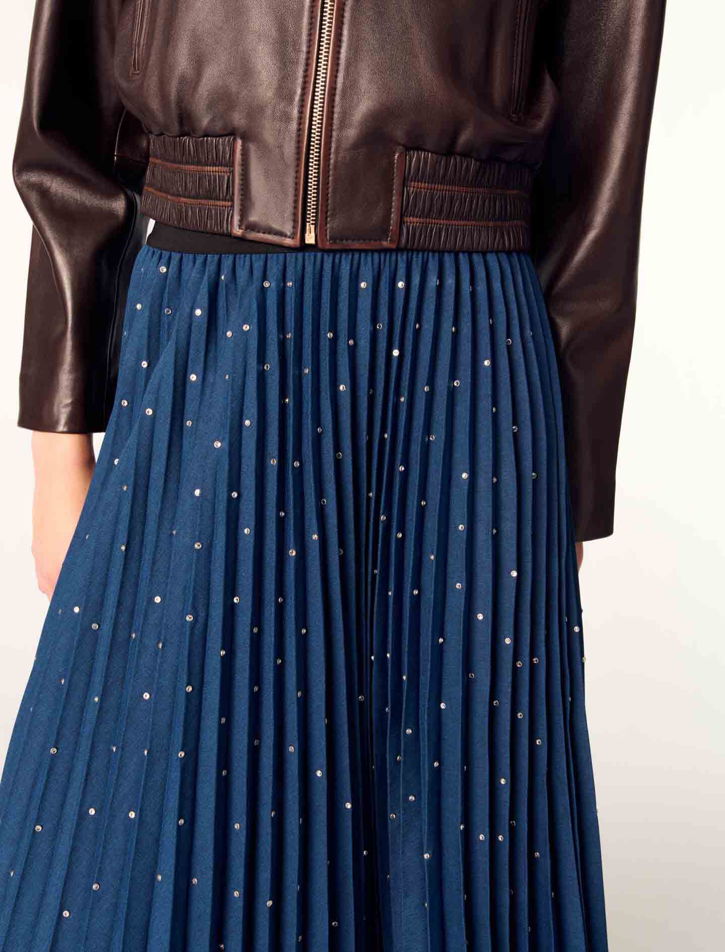 Long pleated skirt with studs