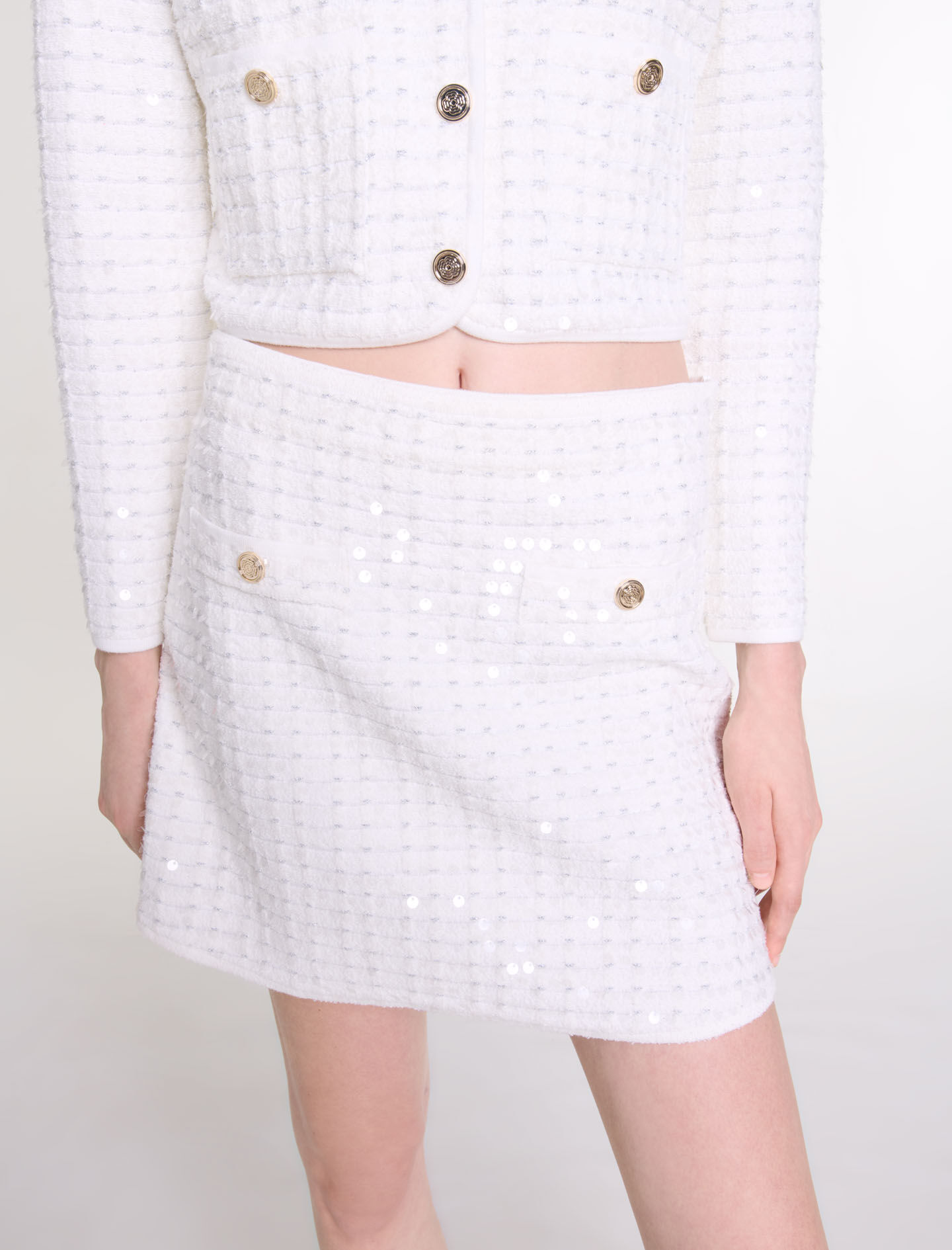 Short sequinned knit skirt