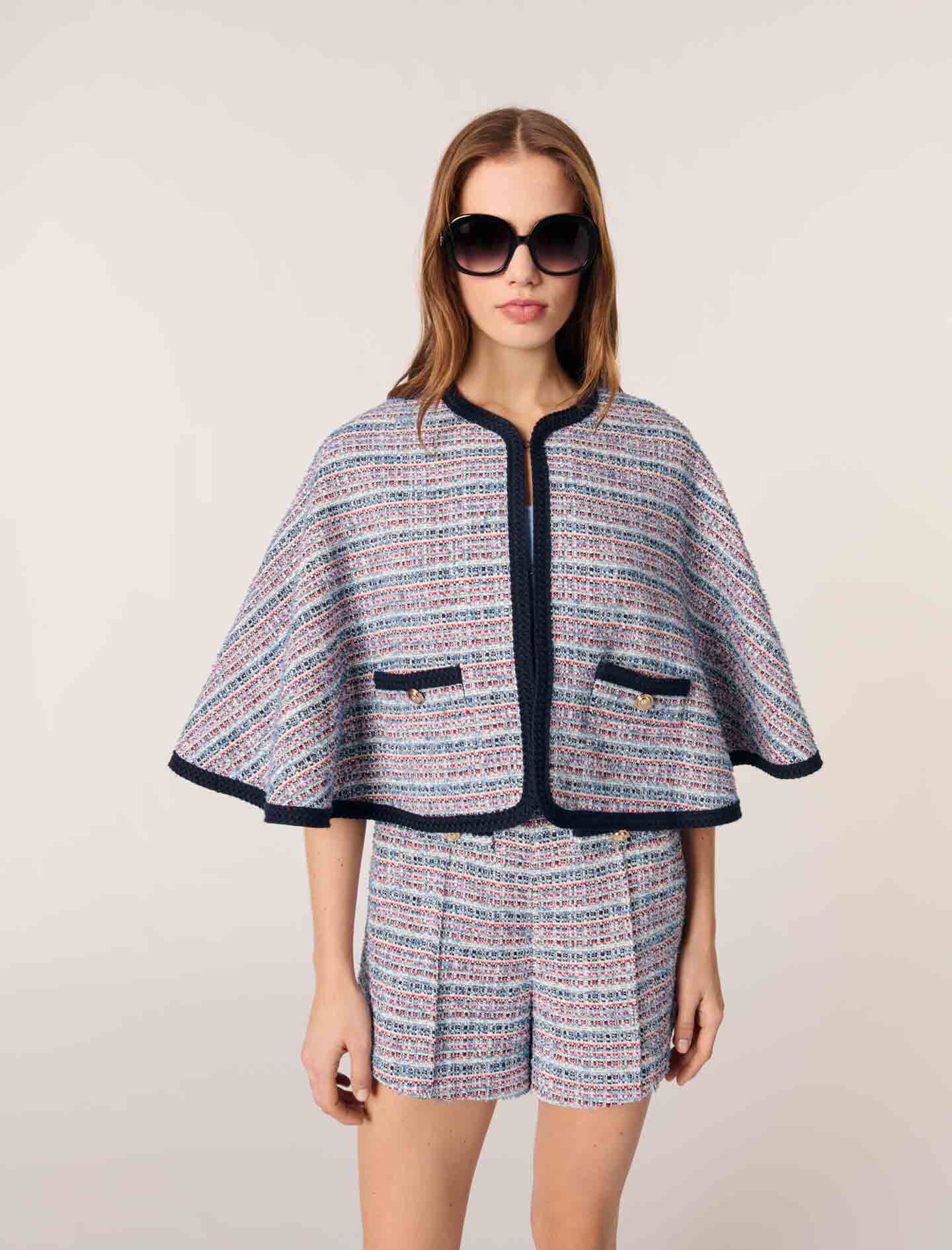 Tweed cape with contrasting trim