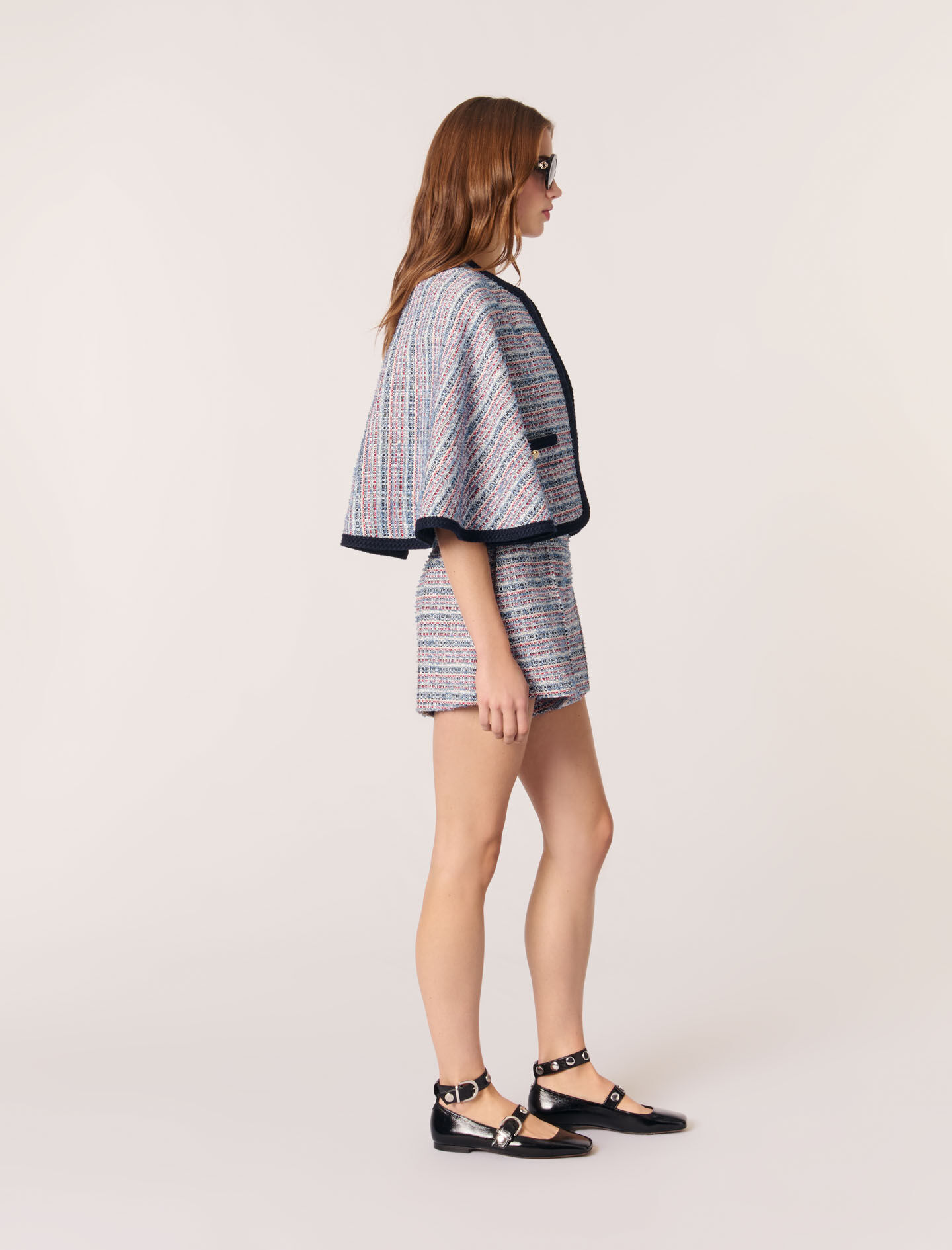 Tweed cape with contrasting trim