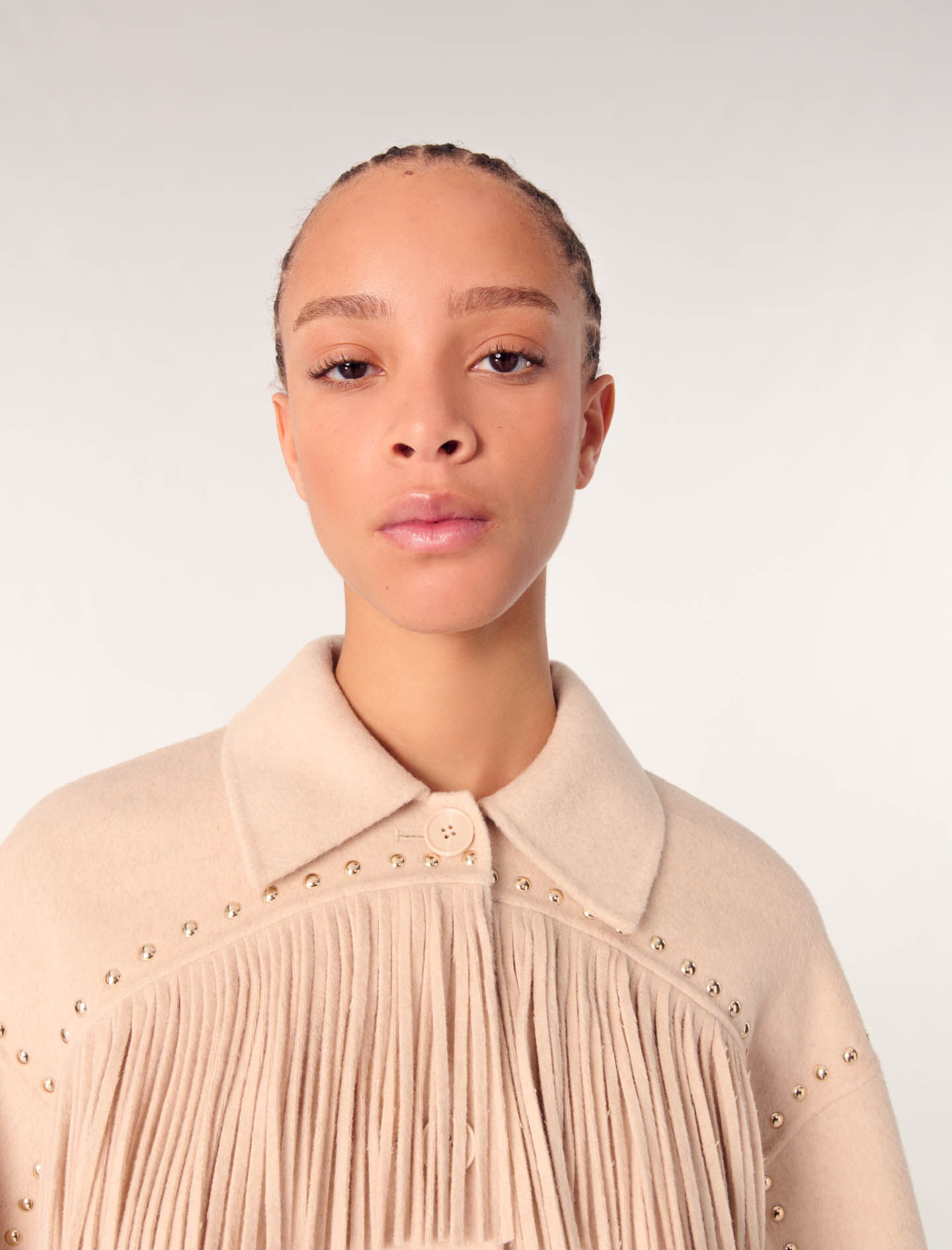 Double-breasted fringed coat