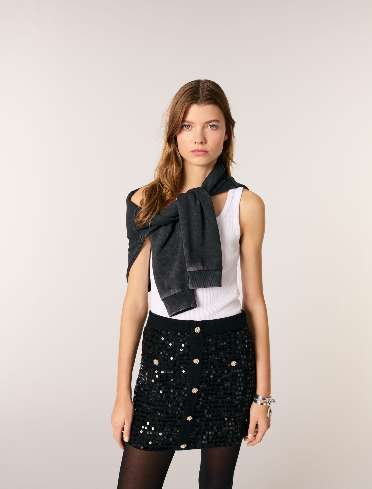 Short sequinned knit skirt